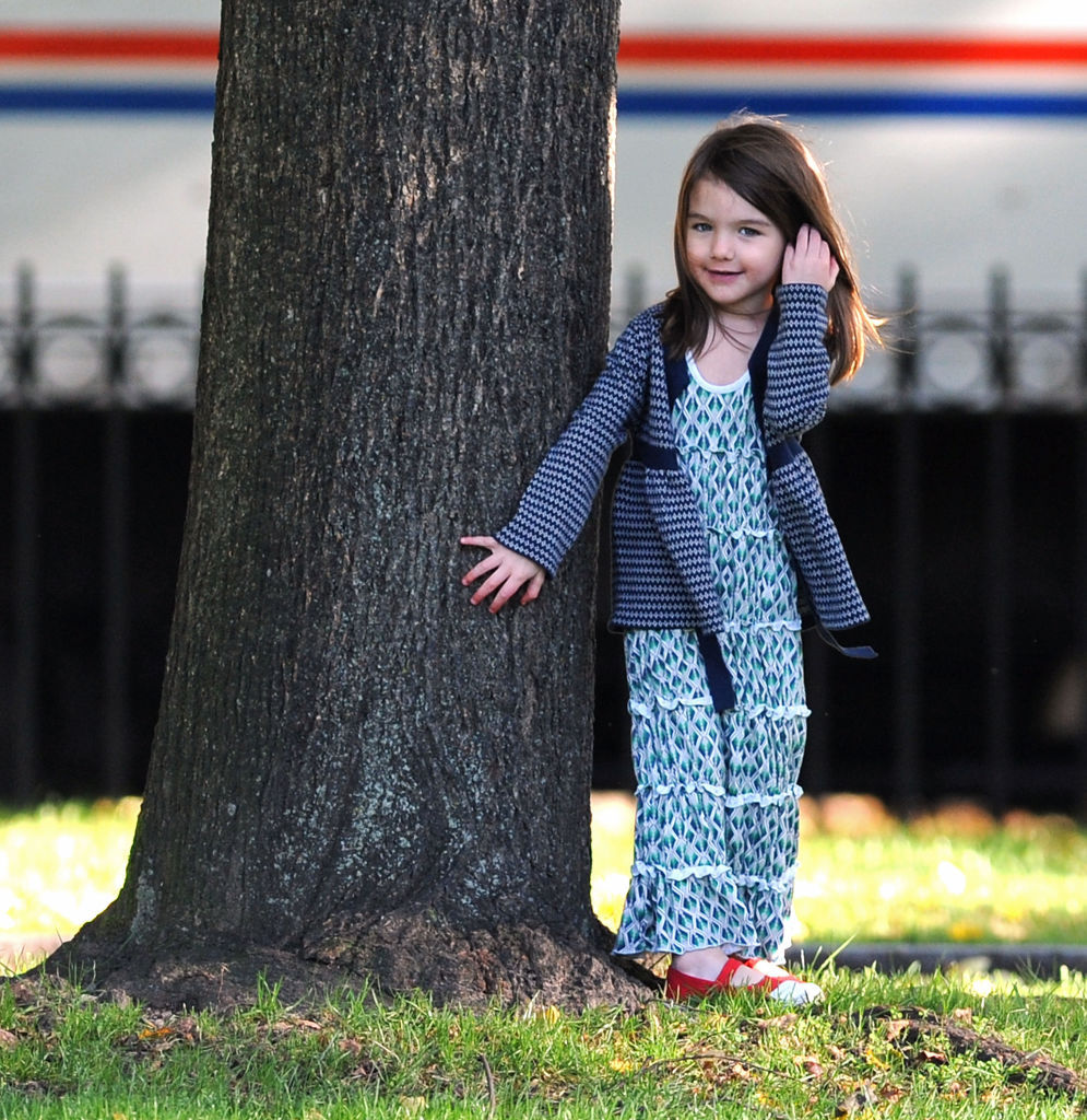 Suri Cruise strikes a pose at Charles River Basin on October 10, 2009.