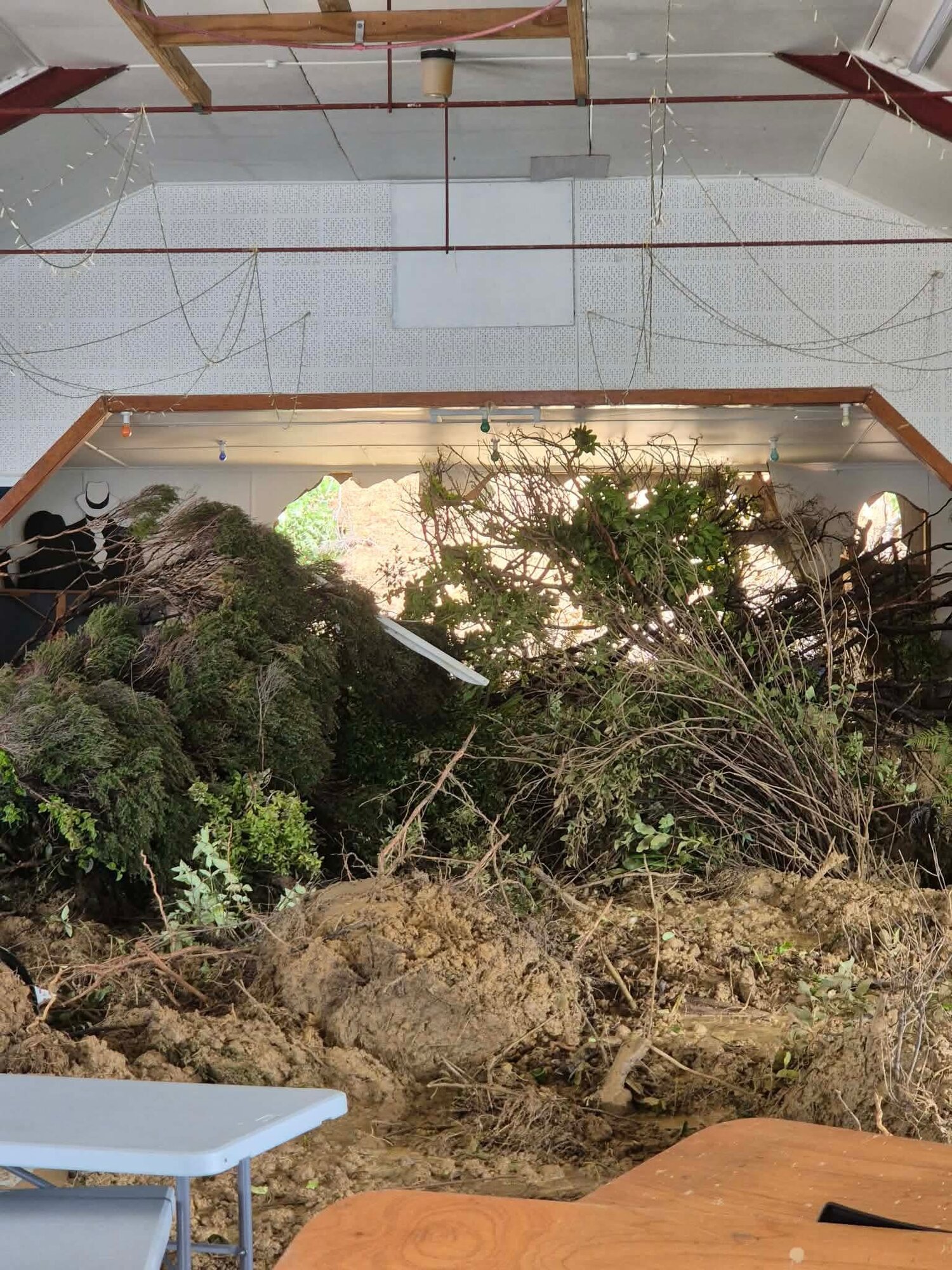 Ōakura community hall was inundated by debris from a landslip. Photo / Whangaruru hau kainga