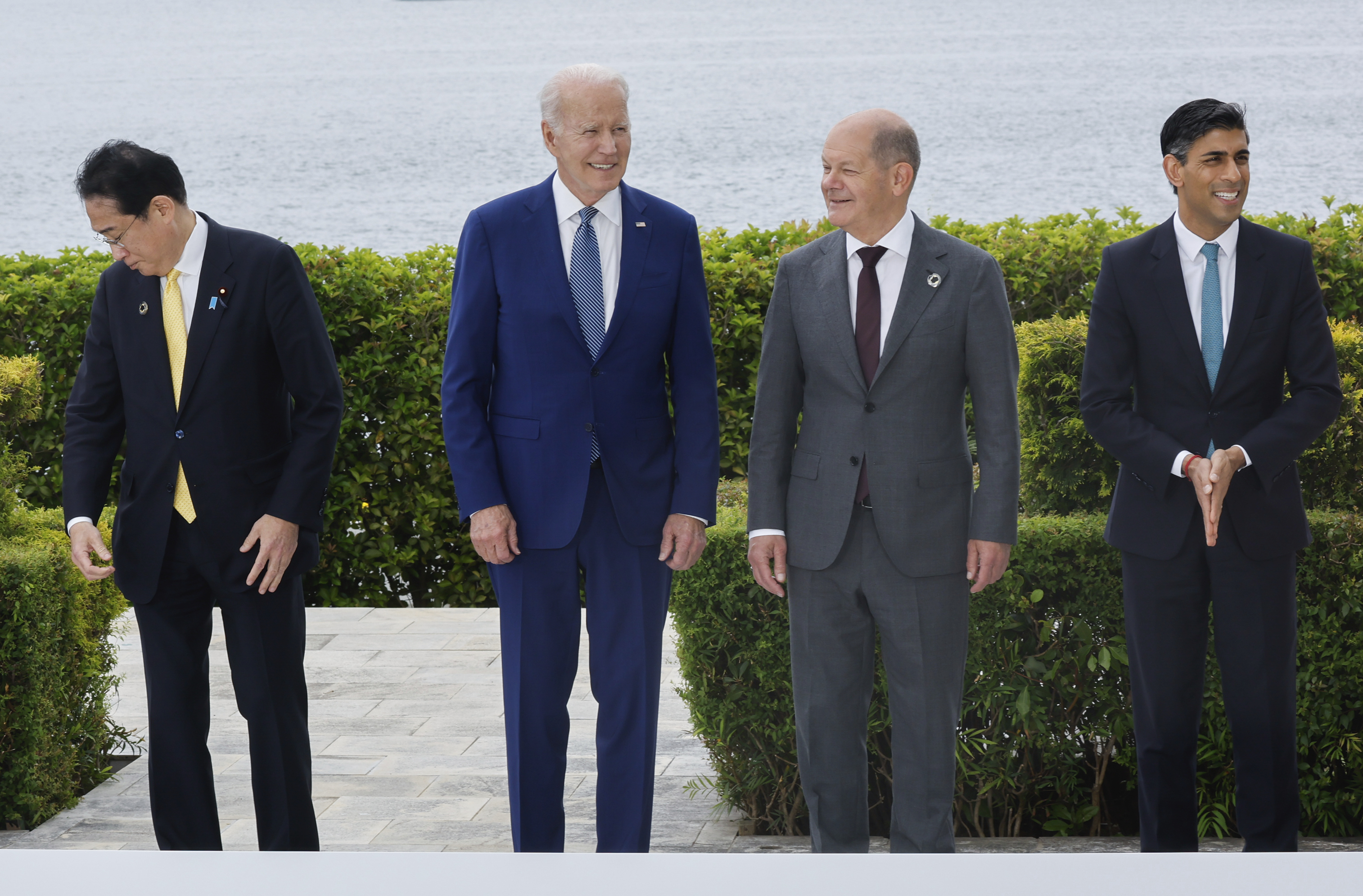 Japan's Prime Minister Fumio Kishida (left), US President Joe Biden, Germany's Chancellor Olaf Scholz and Britain's Prime Minister Rishi Sunak participate in a family photo with G7 leaders. Photo / AP