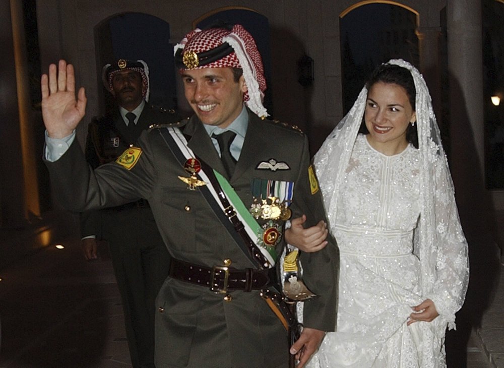 Jordan's Prince Hamzeh and his wife Princess Noor, arrive at Zahran Palace where they celebrate their wedding ceremony in 2004. Photo / AP