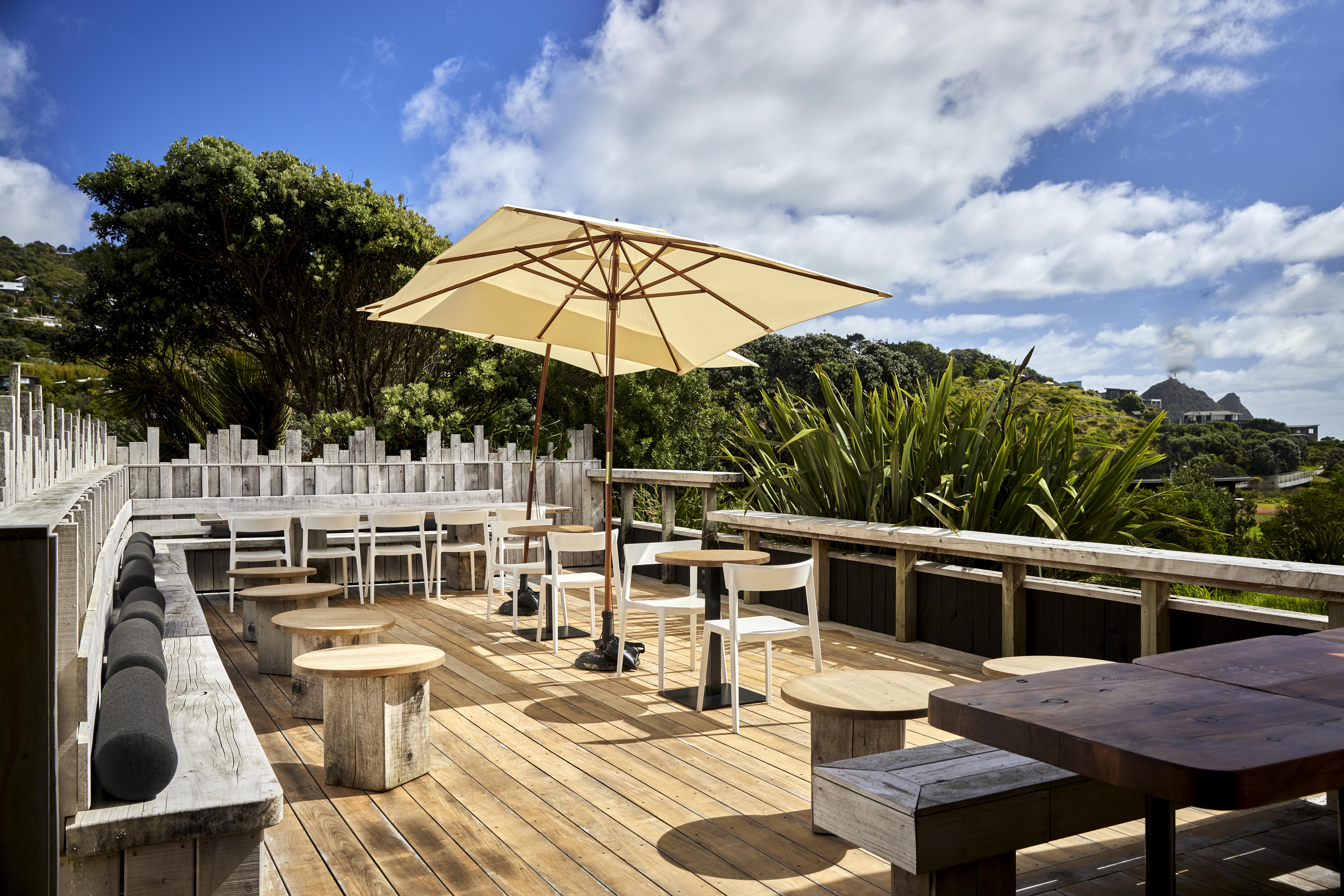 The Sun Deck at Aryeh in Piha is surrounded by trees. Photo / Babiche Martens