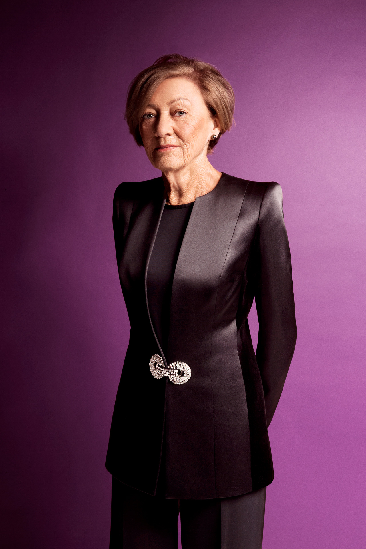 Dame Alison Paterson wearing an Adrienne Winkelmann suit for Viva, 2015. Photo / Guy Coombes