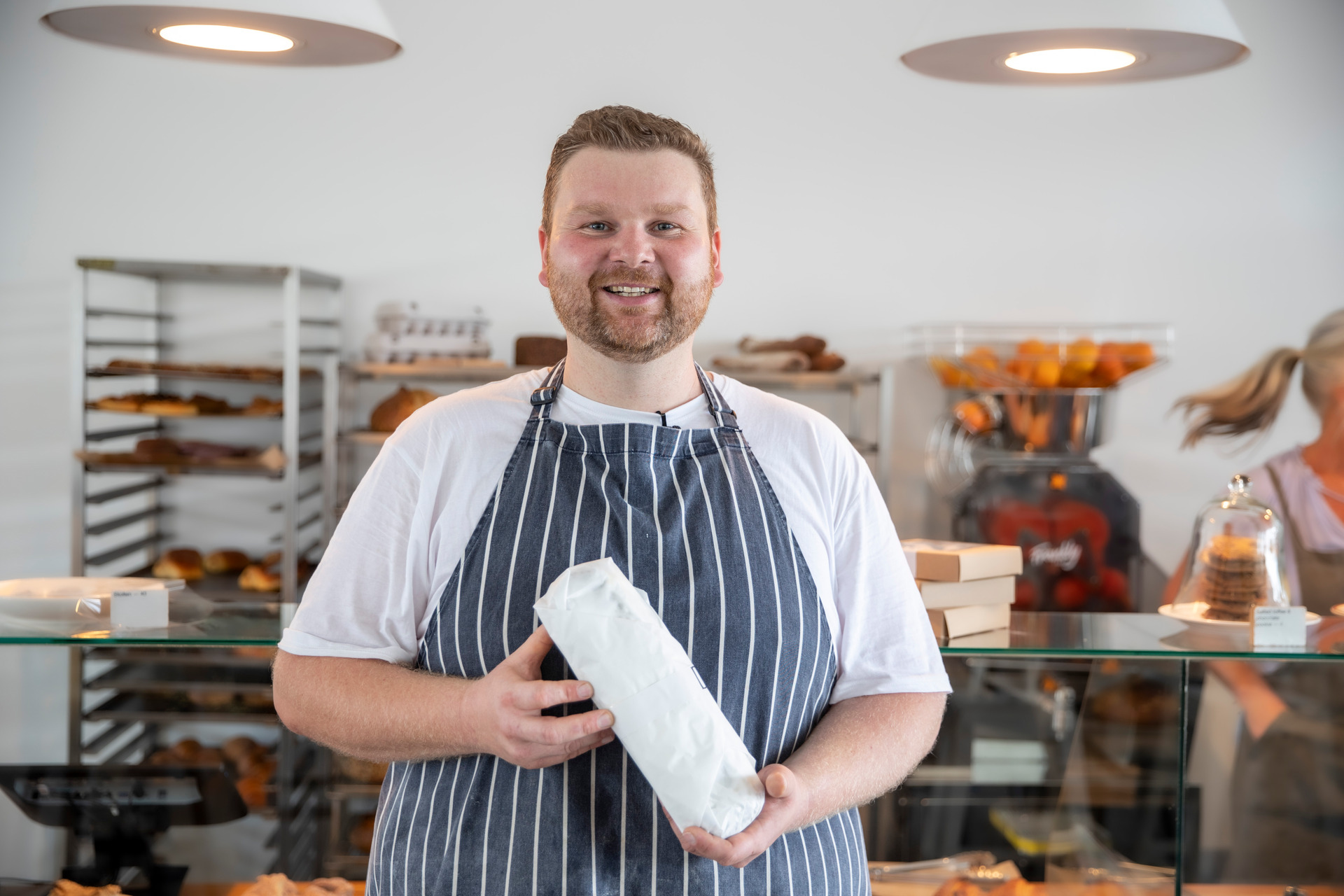 Patrick Welzenbach, Daily Bread co-owner and baker, with a shop-ready stollen. Photo/Michael Craig