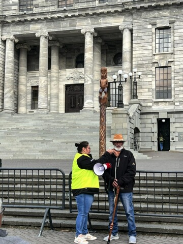 Ngāi Te Rangi Iwi Trust chief executive Paora Stanley (right)  at the steps of Parliament.