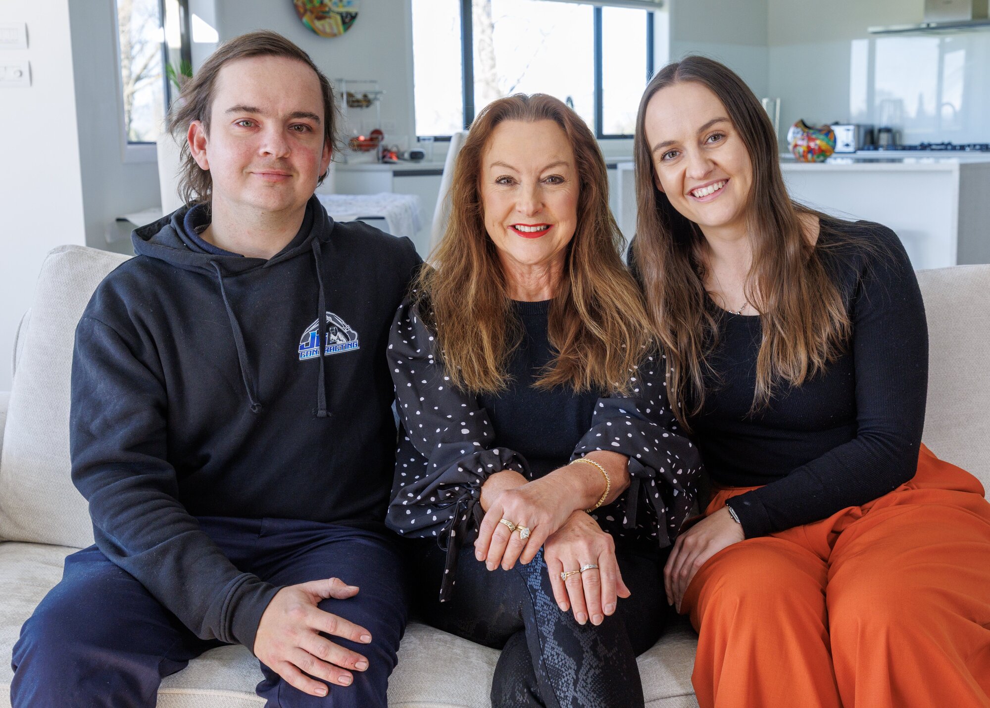 Kidney transplant recipient Elliott Goldfinch with his mother, Charmayne, and sister, Sapphire. Sapphire says when she woke up after her 12-hour operation and saw Elliott, she said: