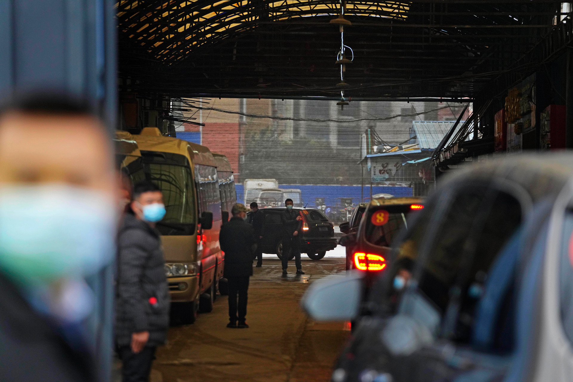 A convoy carrying a World Health Organisation team enters the Huanan Seafood Market on a field visit to seek answers on the origins of the virus. Photo / Ng Han Guan, AP, File