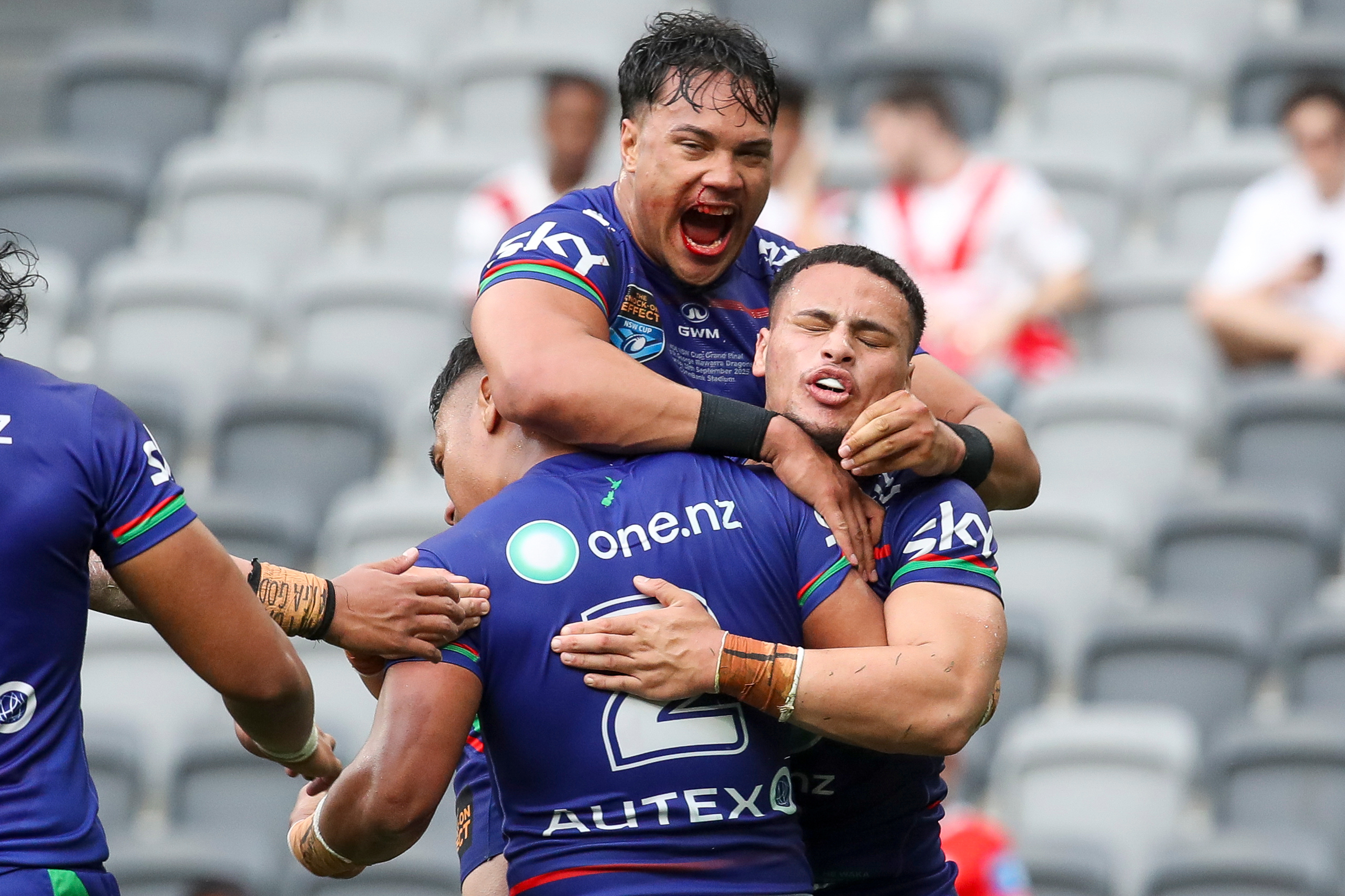 The Warriors celebrate a try in the final. Photo / Photosport