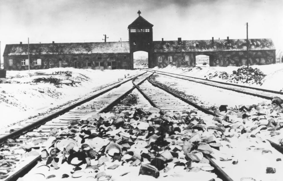 This 1945 photo shows the entry to the concentration camp Auschwitz-Birkenau in Poland, with snow-covered rail tracks leading to the camp. Photo / AP