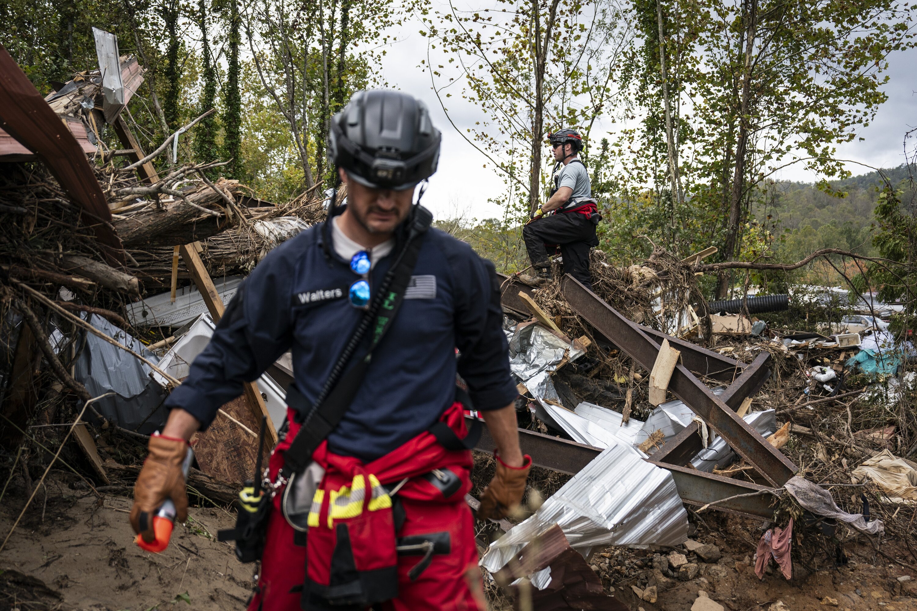 Members of the Illinois Water Rescue 1 team search through debris for survivors in the aftermath of Helene in Swannanoa, North Carolina. Photo / Jabin Botsford, the Washington Post