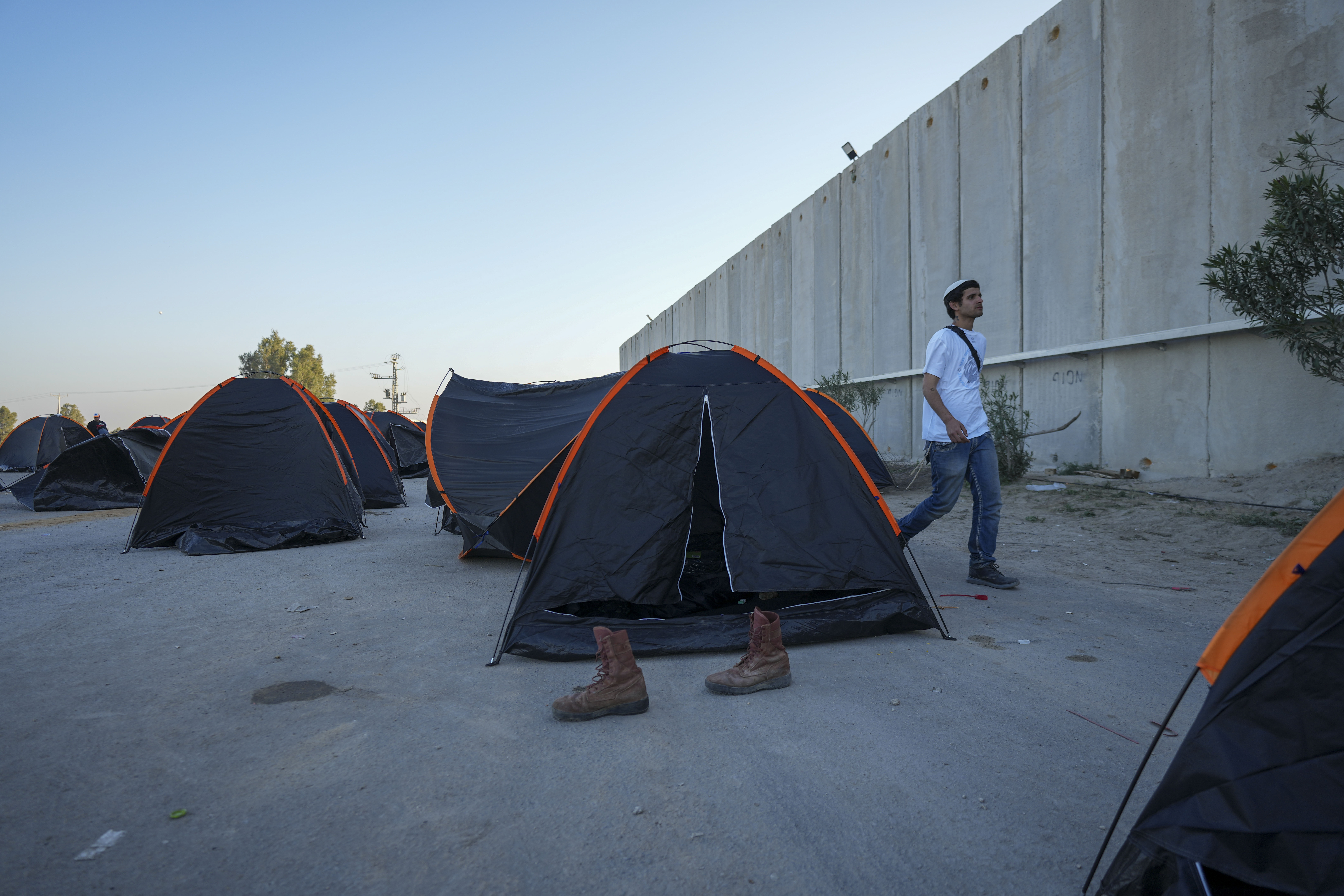 Israeli activists set up tents where they say they spend nights blocking trucks carrying humanitarian aid into the Gaza Strip. Photo / AP