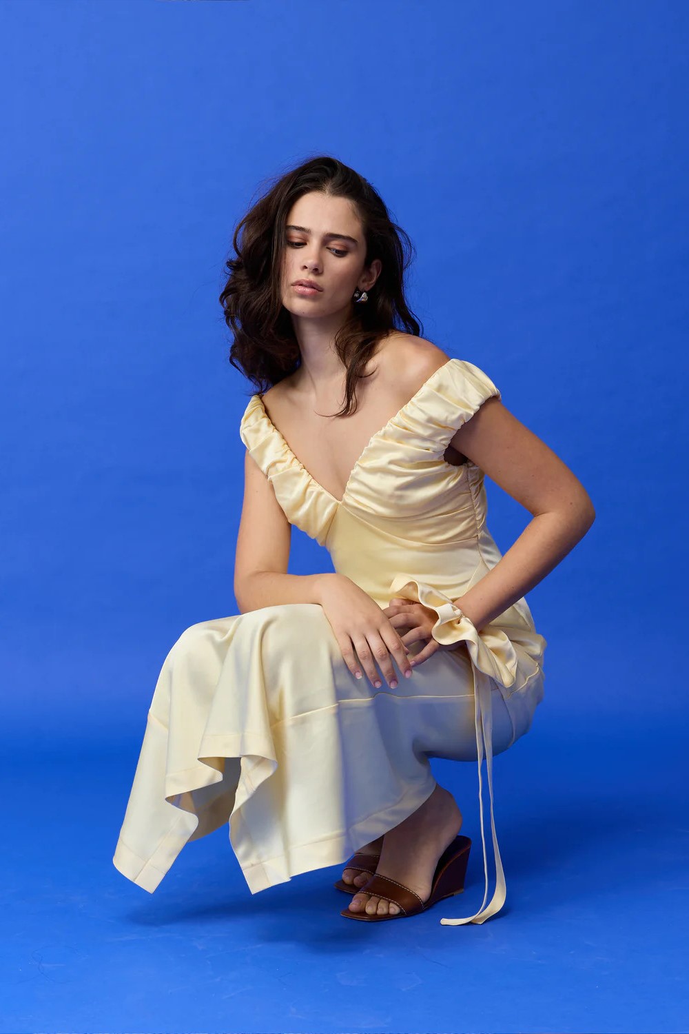 As well as being a glamorous holiday look, the butter satin is made from a textile produced using a circular textile manufacturing process.