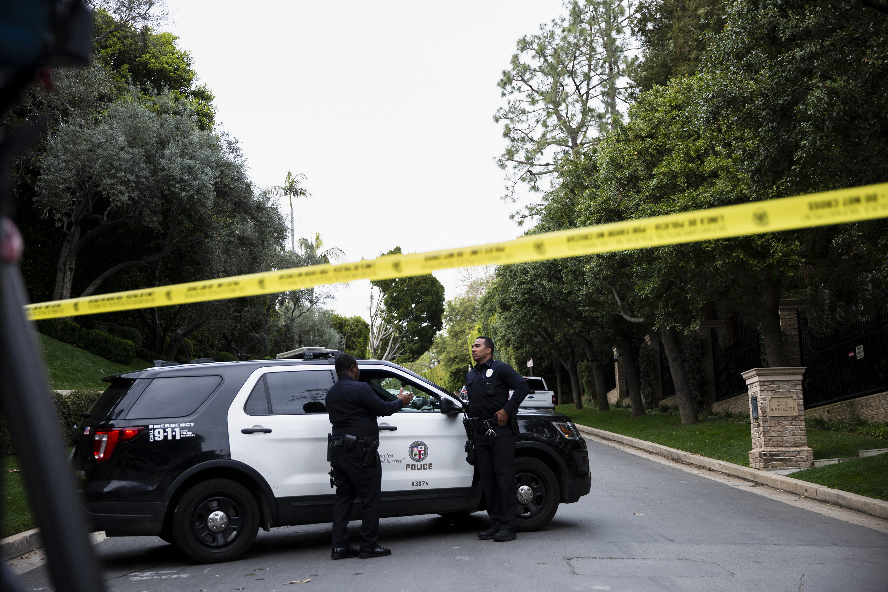 Police blocked off a road near a Los Angeles home tied to Sean Combs. Photo / Jenna Schoenefeld, The New York Times