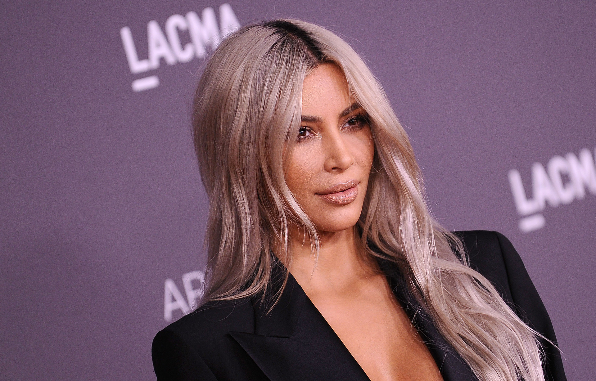 Kim Kardashian shows off famous bum in skintight black leggings after fans  think she got her 'butt fillers removed