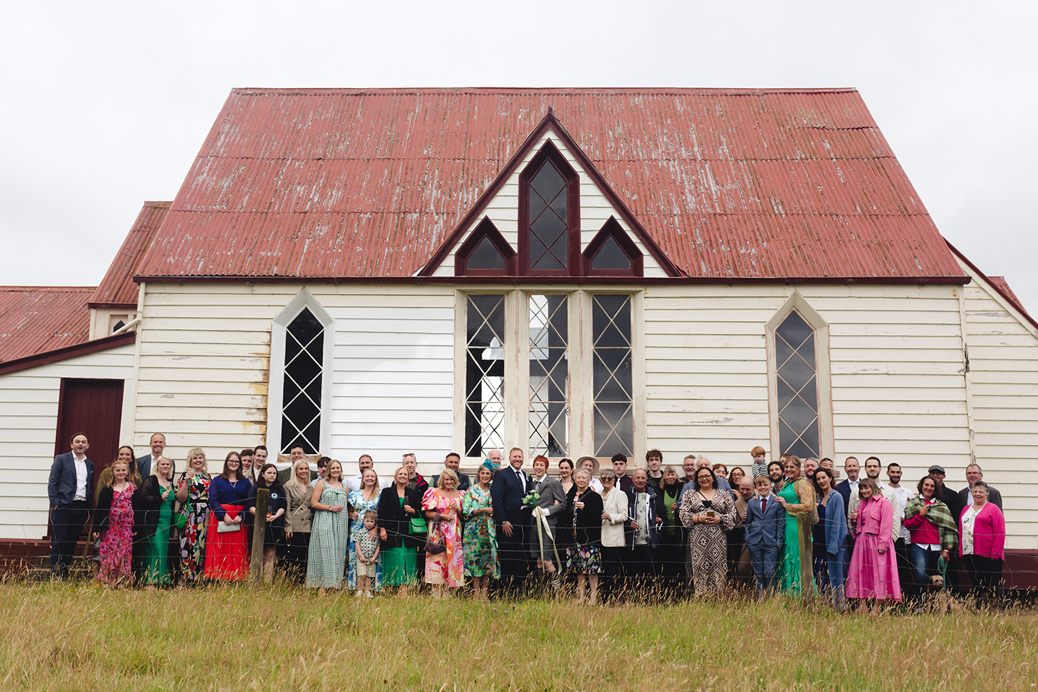 The couple had their ceremony in Kakanui, a small town in coastal Otago that's special for Phillip's family. Photo / Sara Tansy