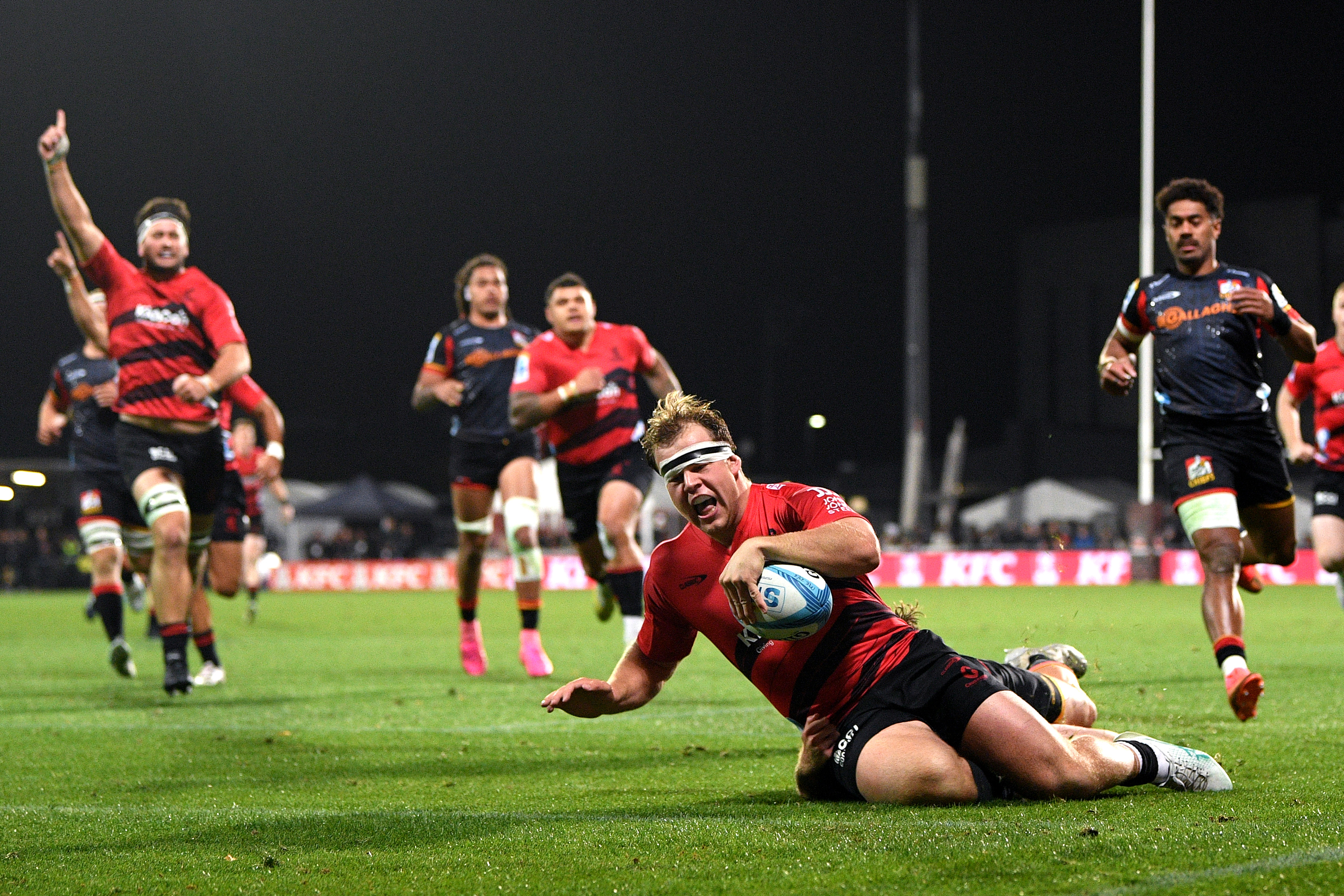 George Bell scores for the Crusaders. Photo / Getty Images