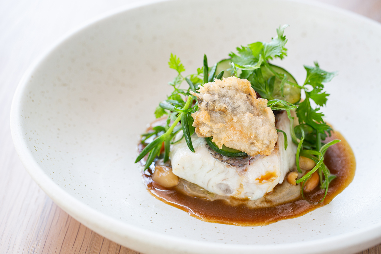 Fish with eggplant, shitake and oyster. Photo / Babiche Martens