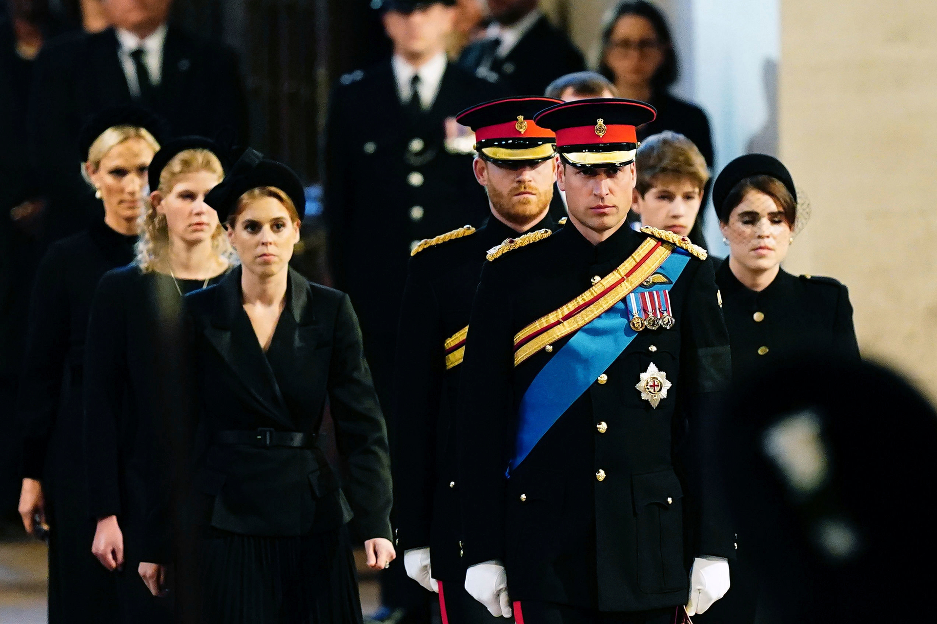 From left: Zara Tindall, Lady Louise, Princess Beatrice, Prince William, the Prince of Wales, Prince Harry, Princess Eugenie, Viscount James Severn and Peter Phillips attend the vigil of the Queen's grandchildren around the coffin, as it lies in state. Photo / AP