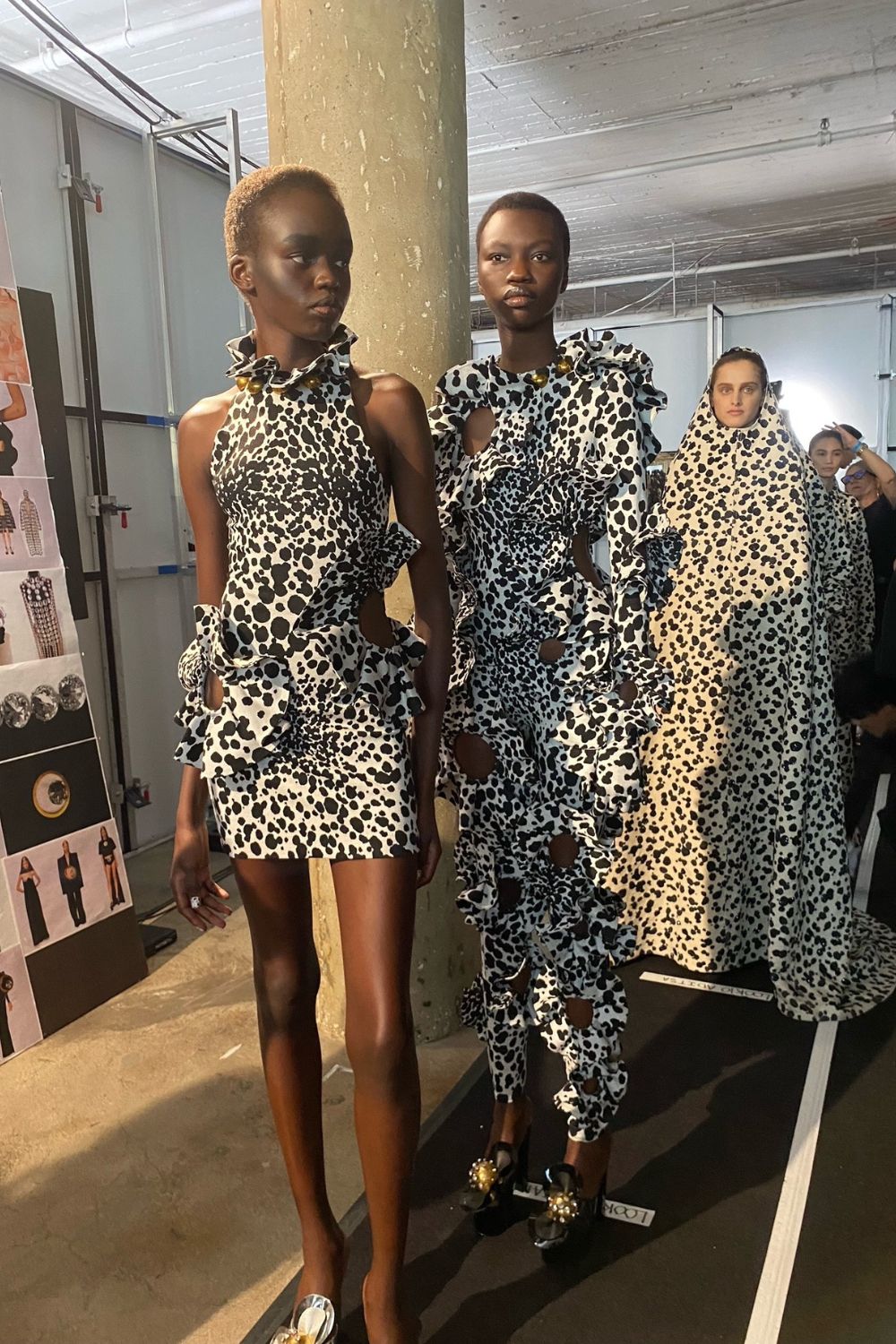 Models assemble in the line-up backstage at Area. 
