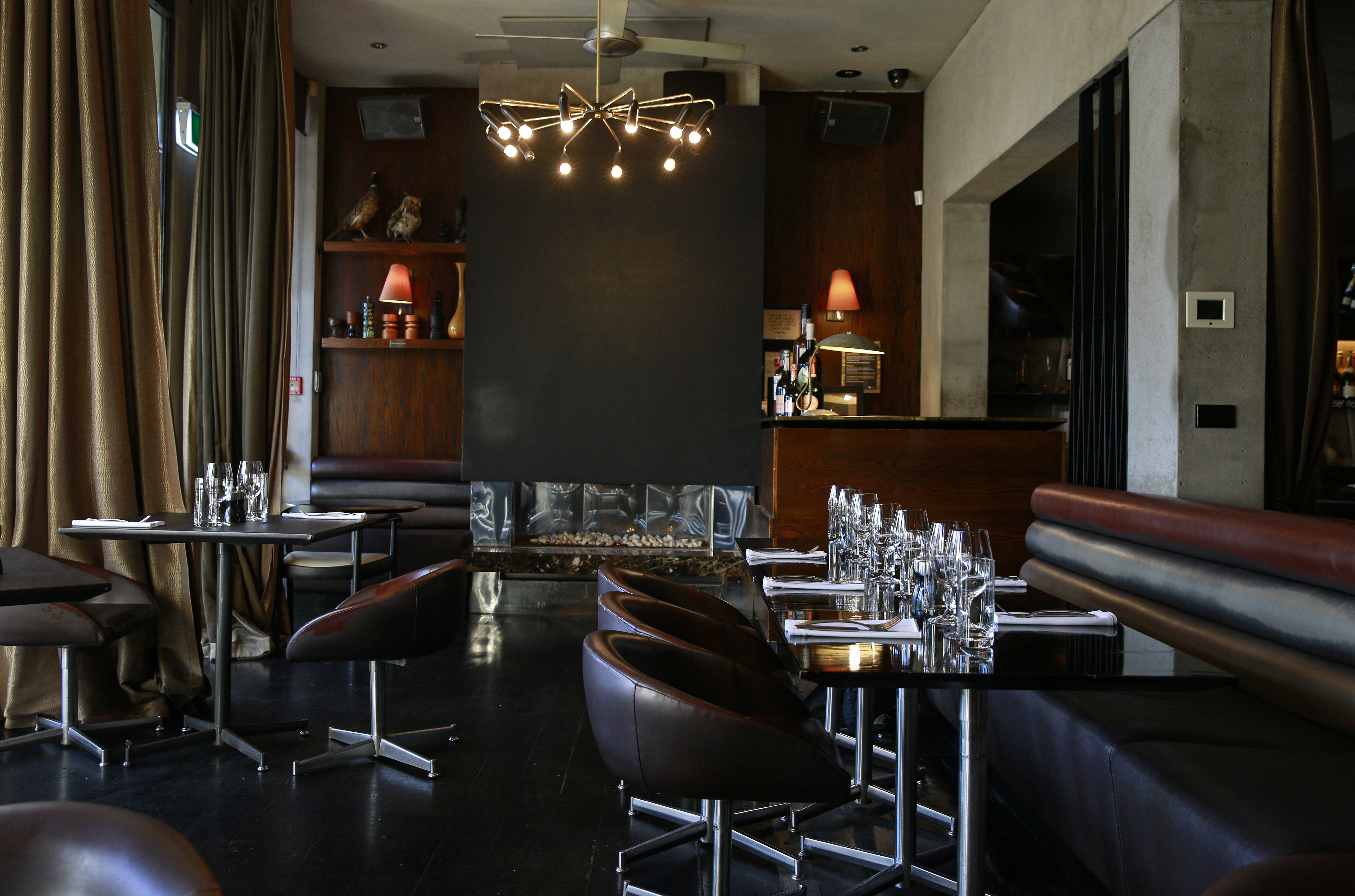 Fireside comfort in the front section of Ponsonby Road Bistro, Auckland. Photo / Alex Burton