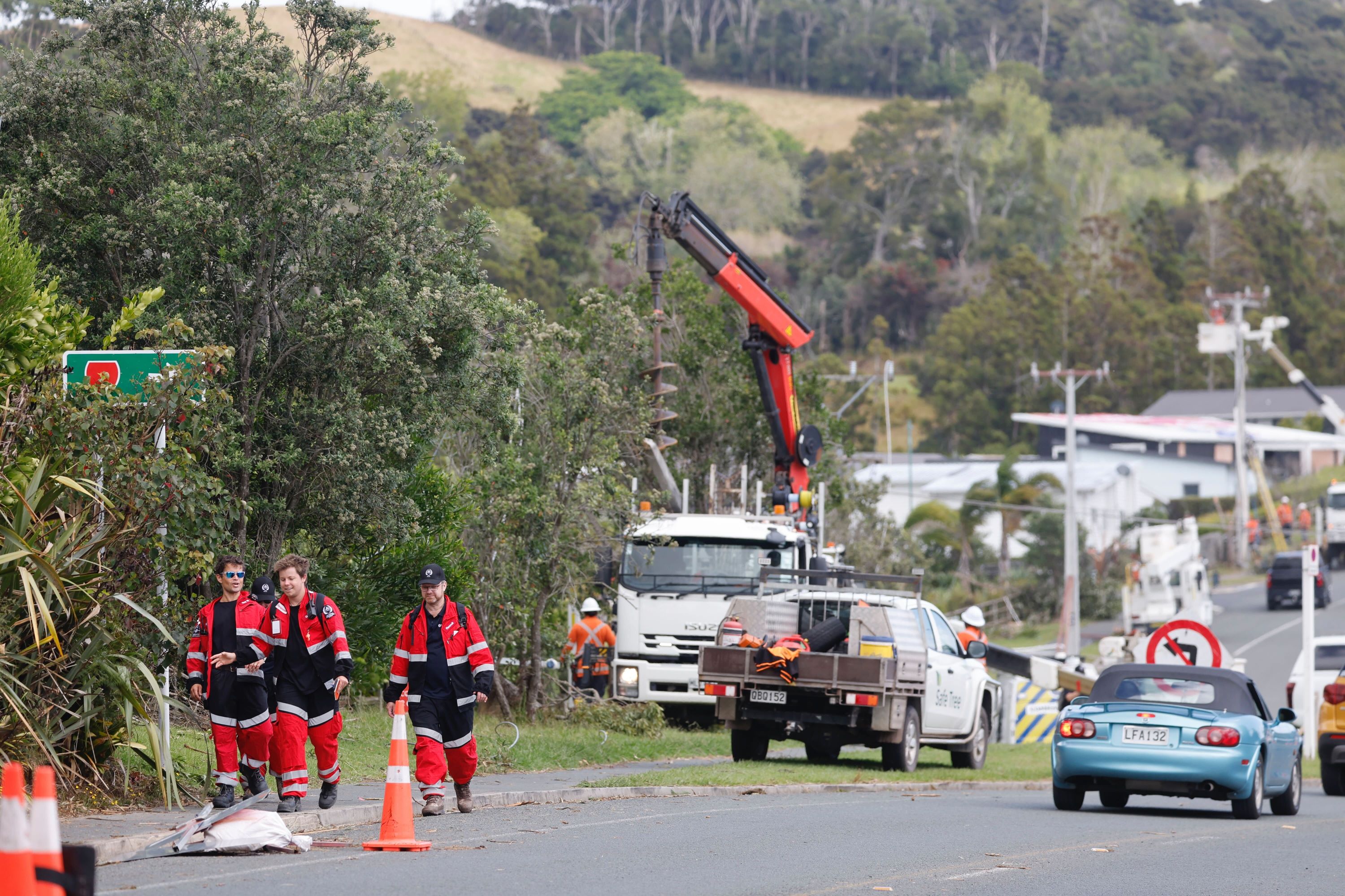 The scene on Old Waipu Rd a day after a tornado seriously injured two people and damaged around 50 properties, as well as power infrastructure, in Mangawhai, north of Auckland. Photo / Michael Craig