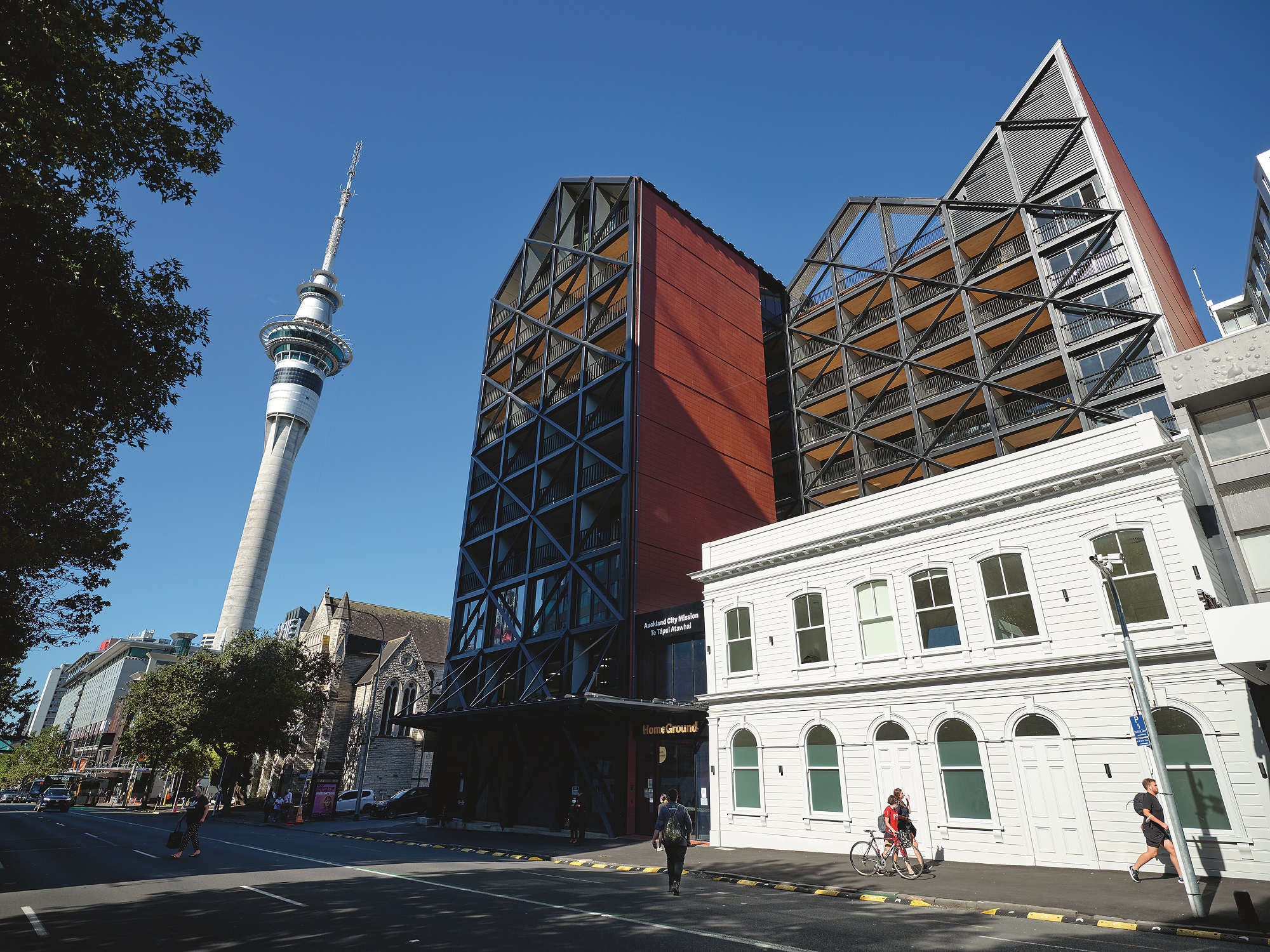 The Auckland City Mission's new HomeGround building on Hobson St, with the restored old building that is still part of the complex. Photo / Mark Smith
