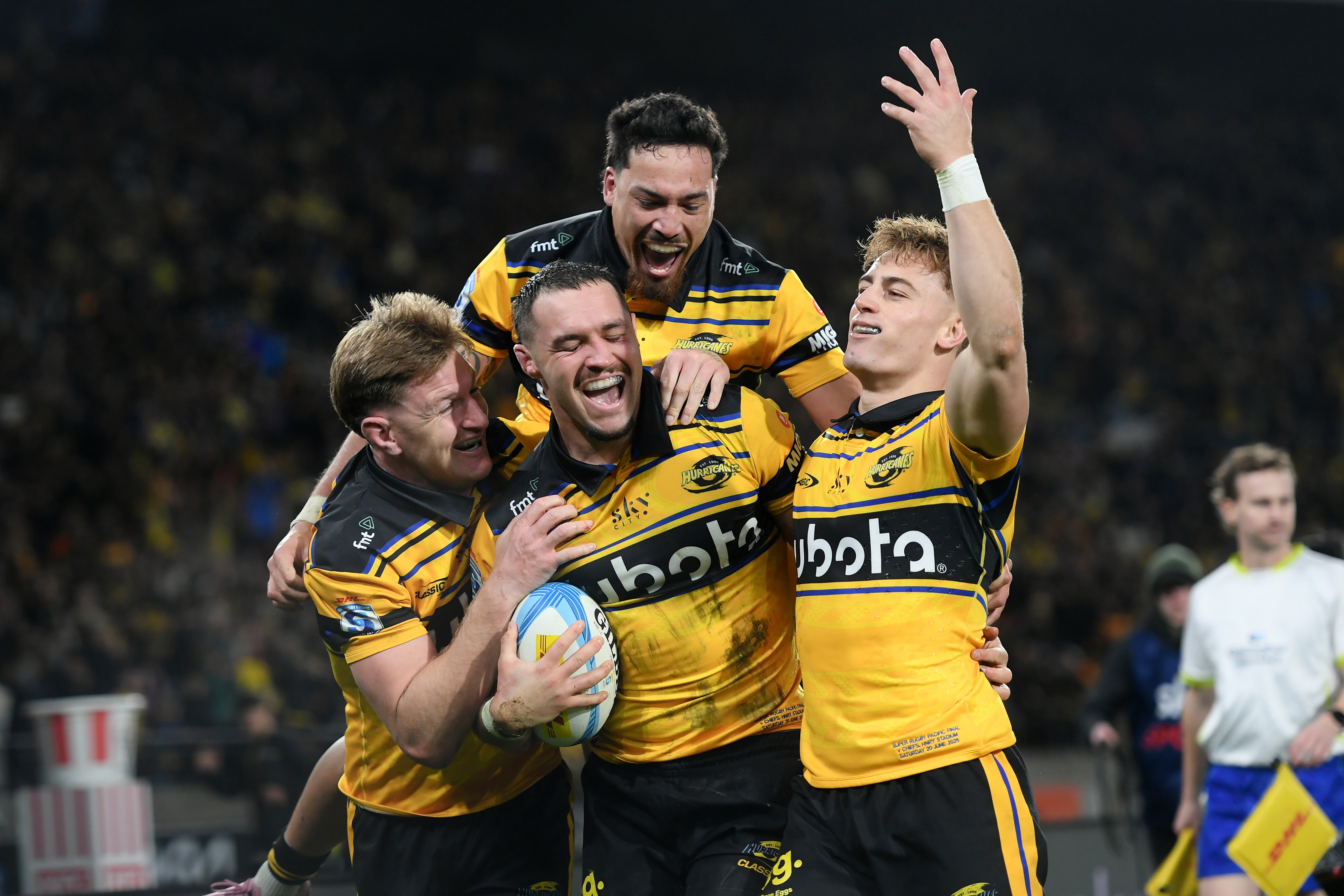 Jordie Barrett, Devan Flanders, Billy Proctor and Ruben Love of the Hurricanes celebrate. Photo / Photosport