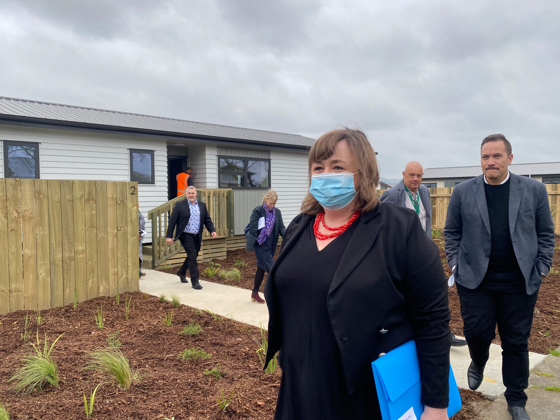 Housing Minister Megan Woods and other officials at the Malfroy Rd and Ranolf St development. Photo / Kelly Makiha