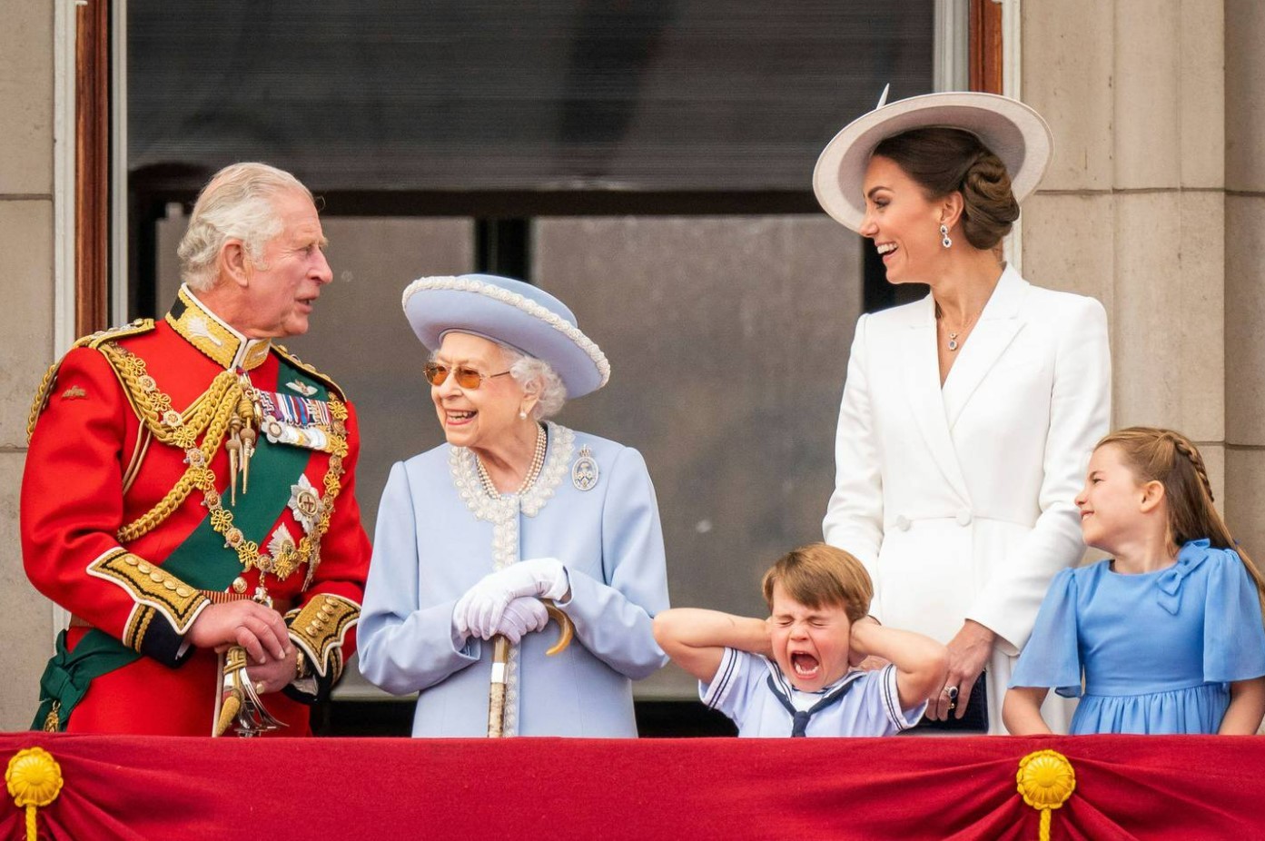Britain's Prince Charles, Queen Elizabeth II, Prince Louis, Kate, Duchess of Cambridge and Princess Charlotte stand on the balcony of Buckingham Palace. Photo / AP