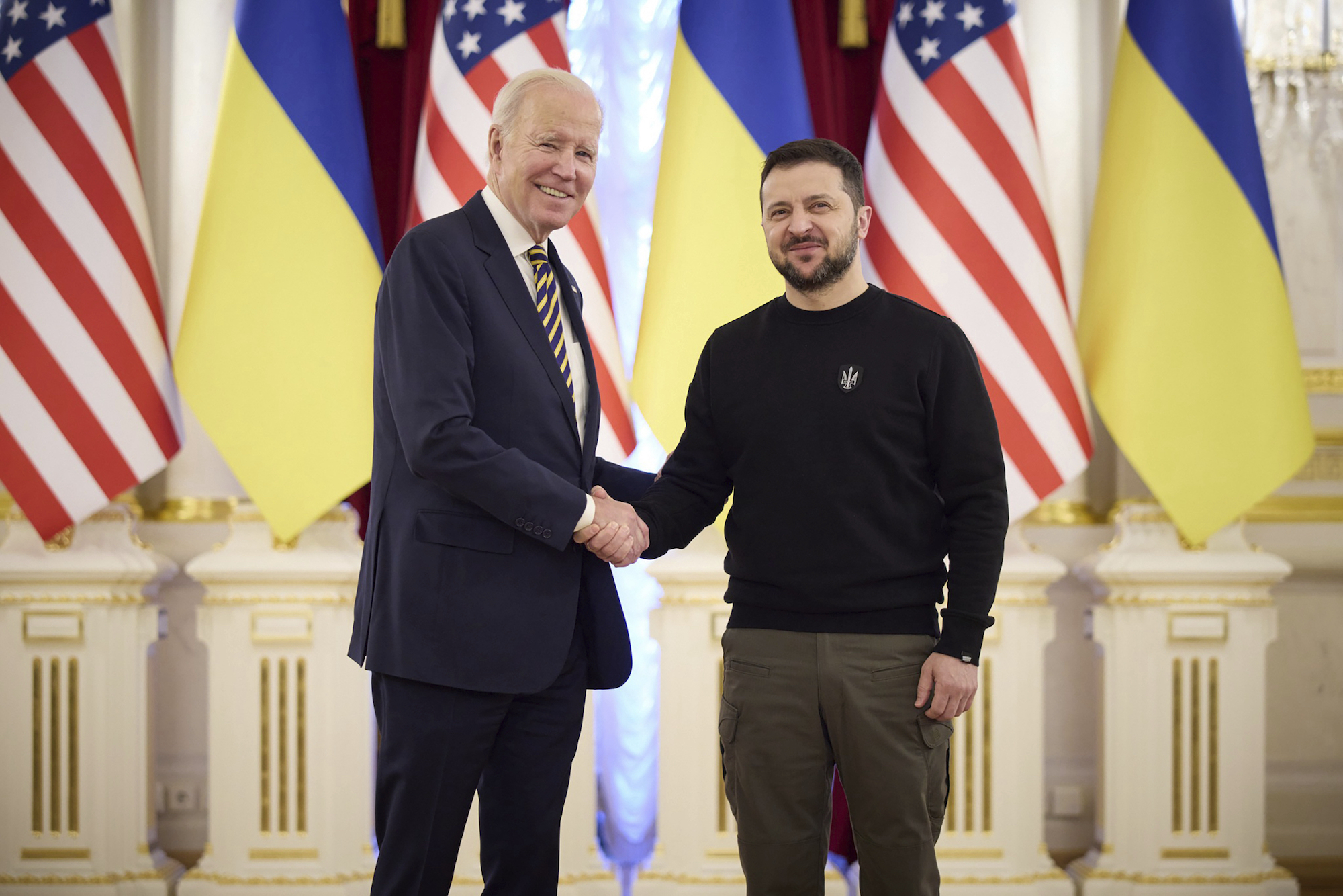 US President Joe Biden and Ukrainian President Volodymyr Zelenskyy shake hands during their meeting in Kyiv, Ukraine, this week. Photo / AP  