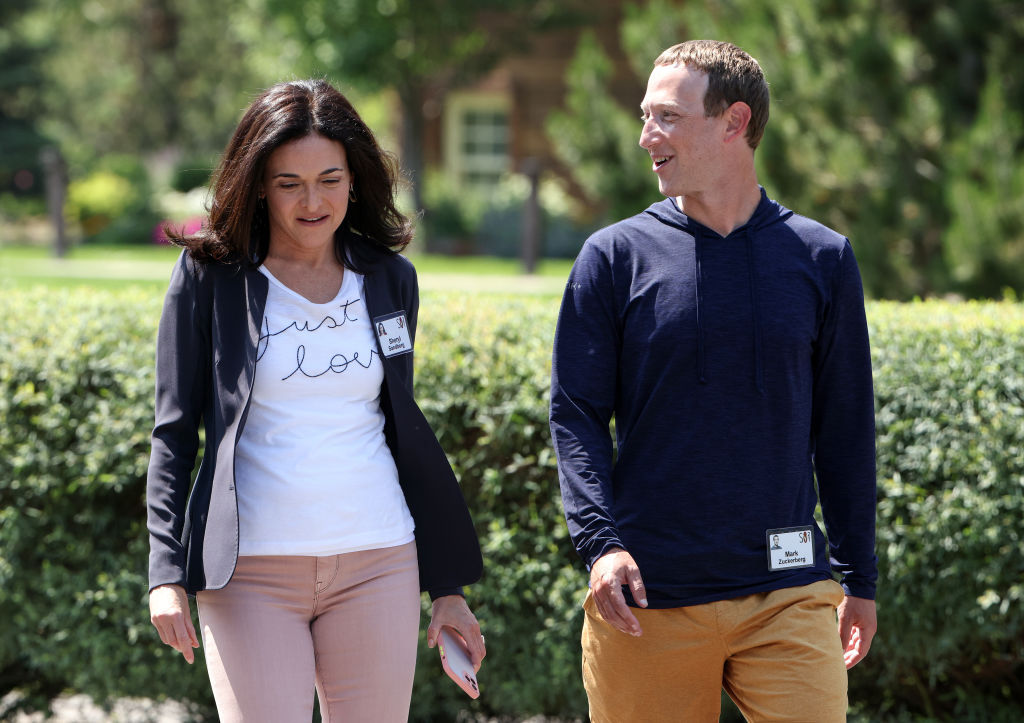 Facebook founder, CEO and chairman Mark Zuckerberg (pictured with Facebook COO and director Sheryl Sandberg in July 2021) holds a minority the social network's stock but exercises majority control through super-voting shares that give him the power to knock back resolutions put forward by activist investors. Photo / Getty Images