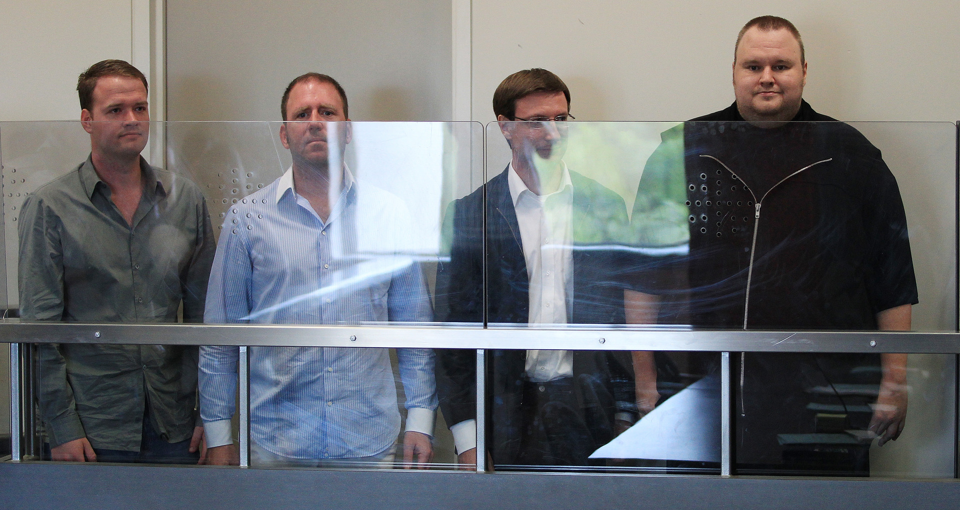 The first court appearance in 2012 for Megaupload executives Bram van der Kolk, Finn Batato, Mathias Ortmann and Kim Dotcom. Photo / File