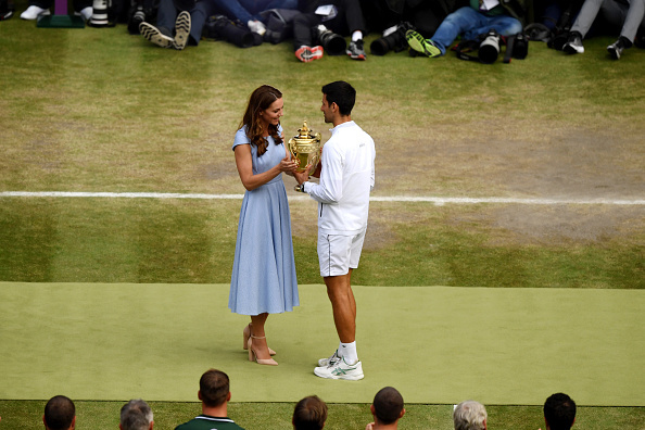 Novak Djokovic of Serbia is presented with the trophy by Catherine Duchess of Cambridge. Photo / Getty Images