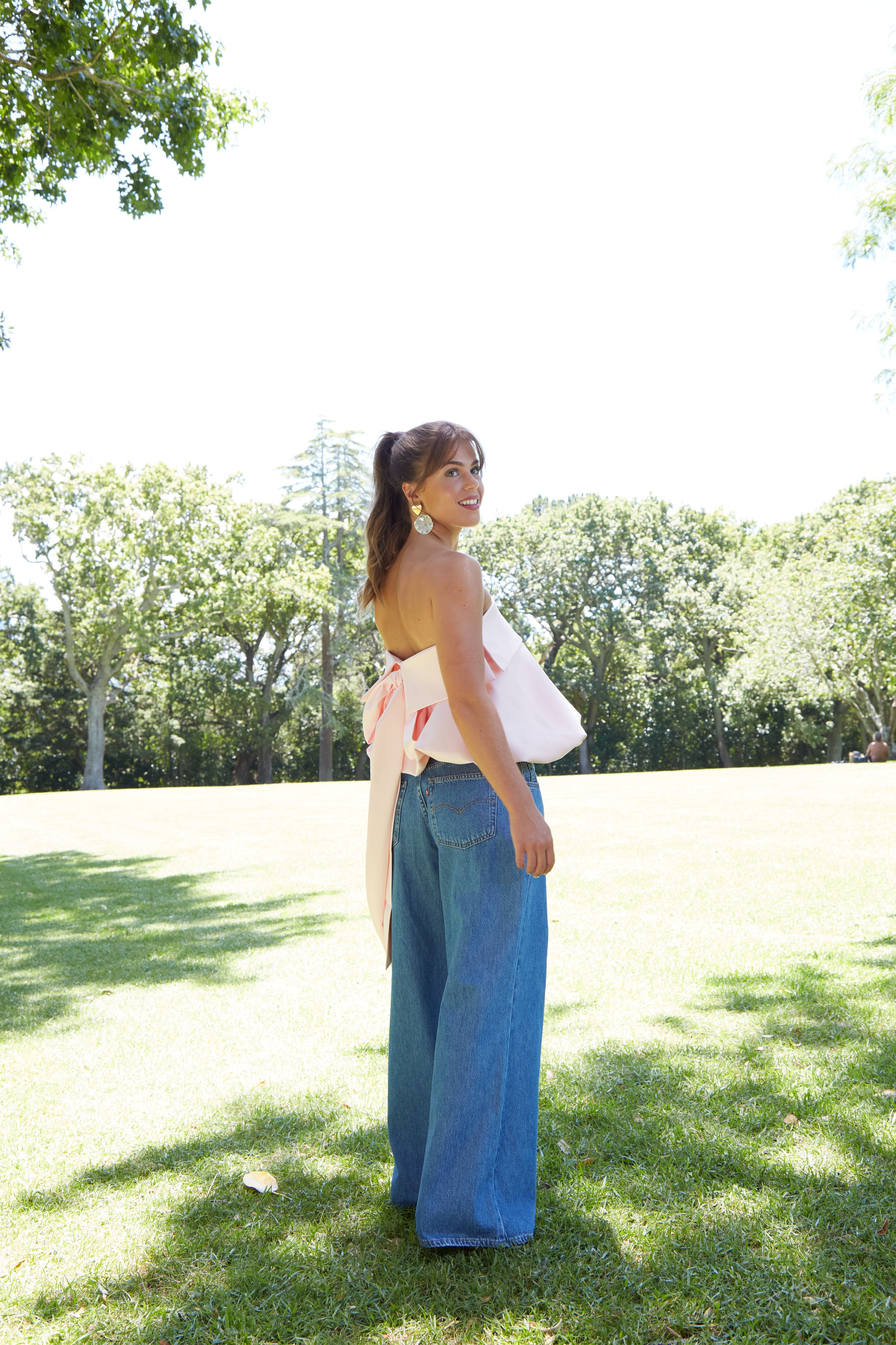 Henderson is set to release two more EPs this year to follow The Pink Chapter. Cassie wears a Harris Tapper top, Levi's jeans and Anoushka Van Rijn earrings. Photo / Marissa Findlay