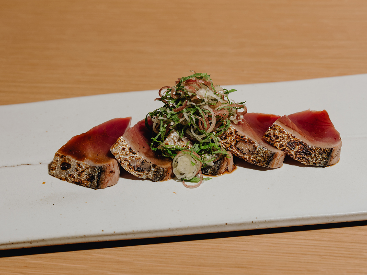 Skipjack tuna sashimi served at Morihiro, a sushi bar in the Atwater Village neighbourhood of Los Angeles. Photo / Rozette Rago, The New York Times
 



