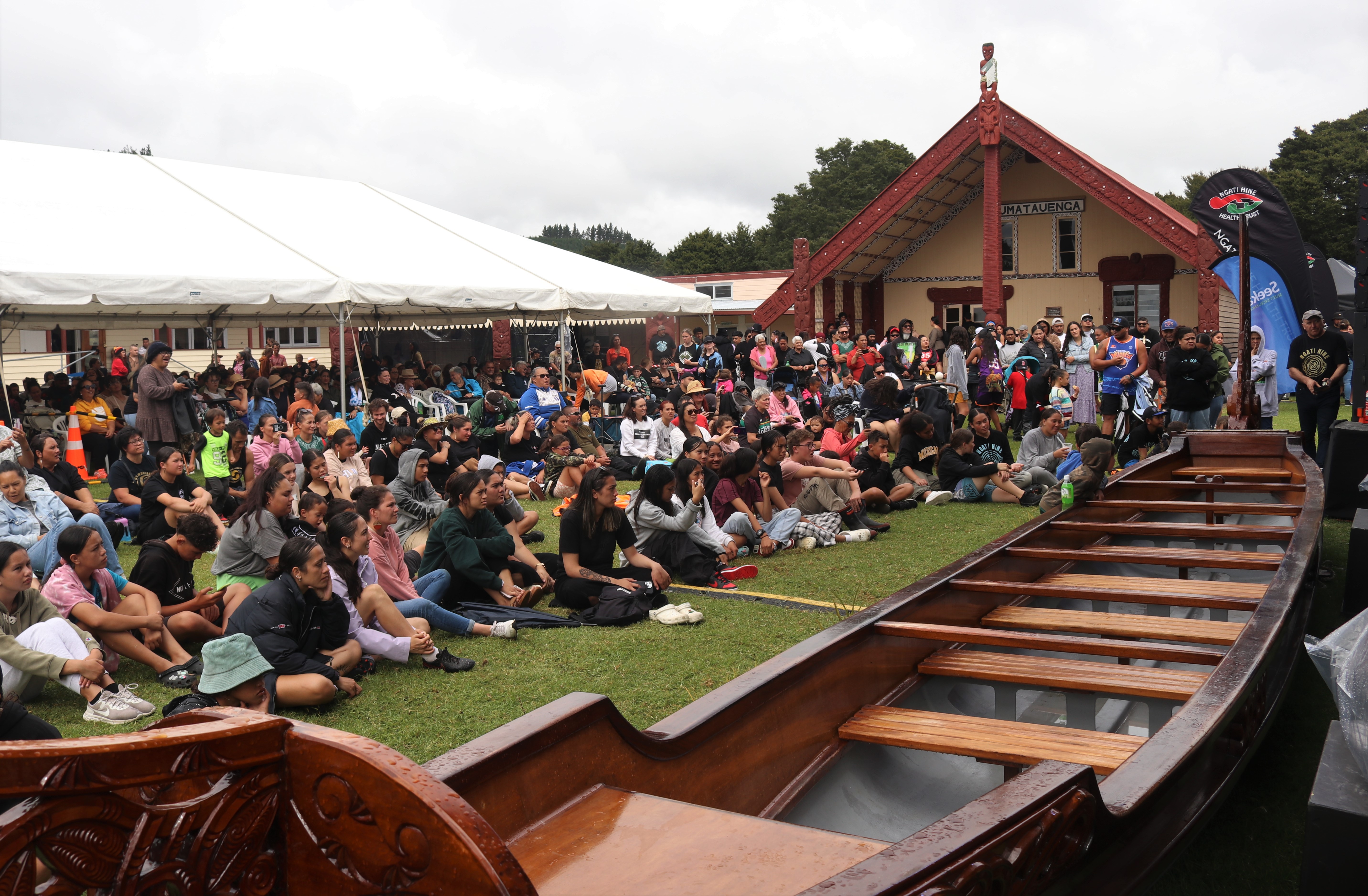 Occasional showers didn’t keep the crowds away at Otiria Marae. Photo / Peter de Graaf