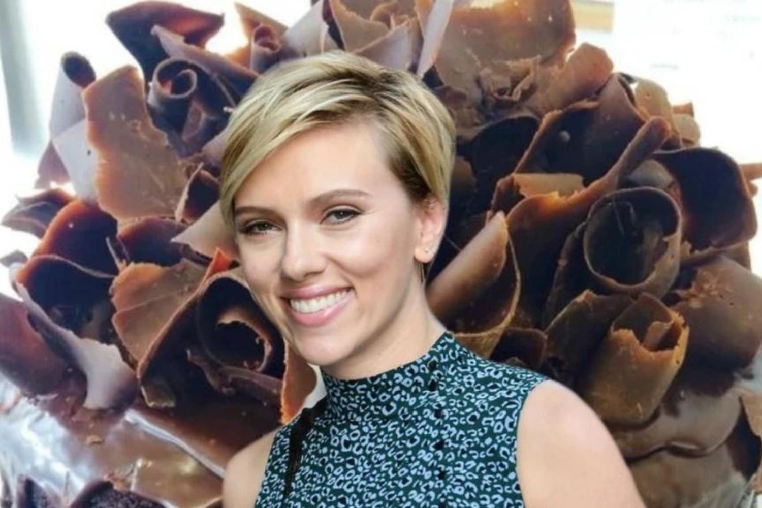 ScarJo and the Zany Zeus cake in question. Photo / The Spinoff