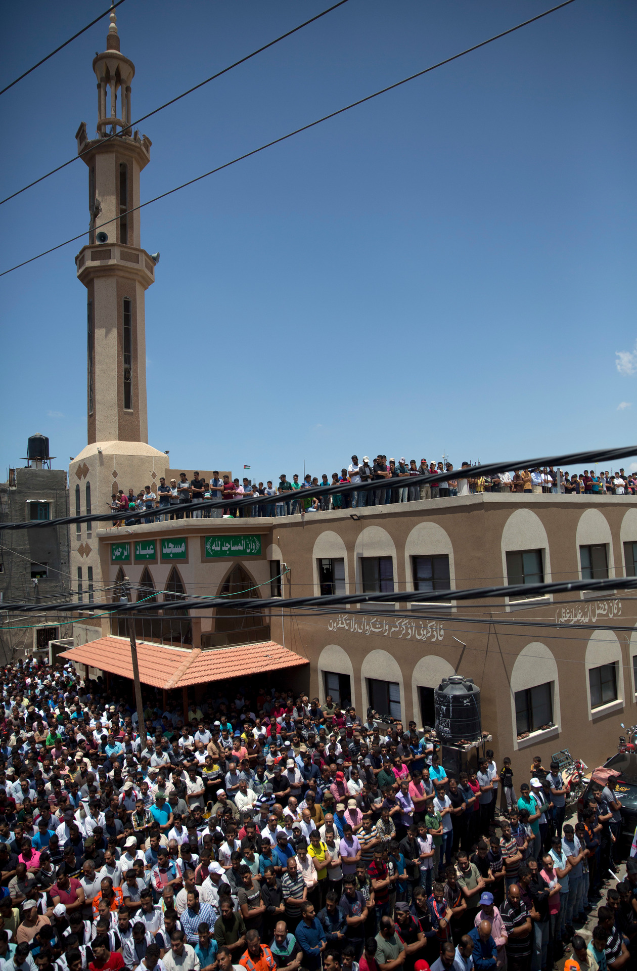 Palestinian mourners attend the prayer during a funeral service for a volunteer paramedic Razan Najjar, 21. Photo / AP