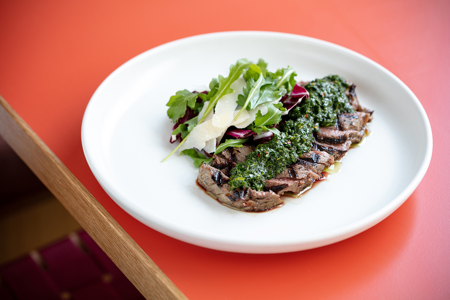 The steak with chimichurri, parmesan and rocket. Photo / Babiche Martens