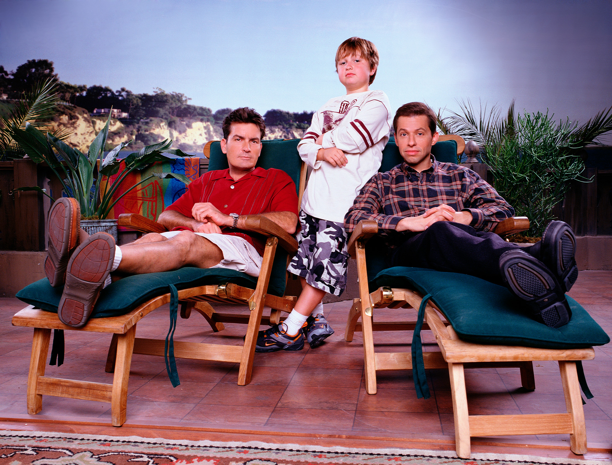 Charlie Sheen (left), Jon Cryer (right) and Angus T. Jones (middle) starred in the television comedy Two and a Half Men. Photo / Getty Images