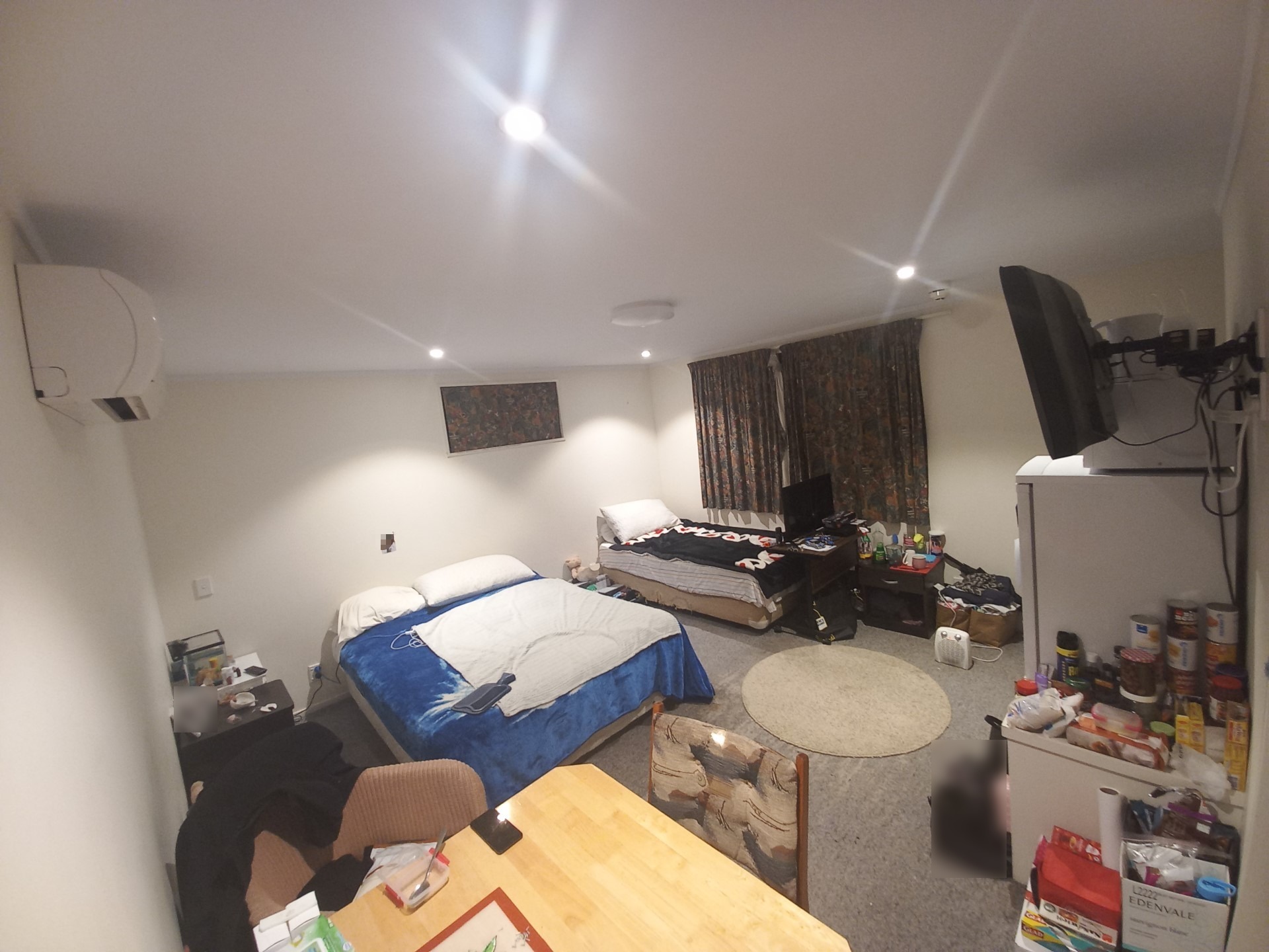 A nurse and her children have been living in this motel room for one year.