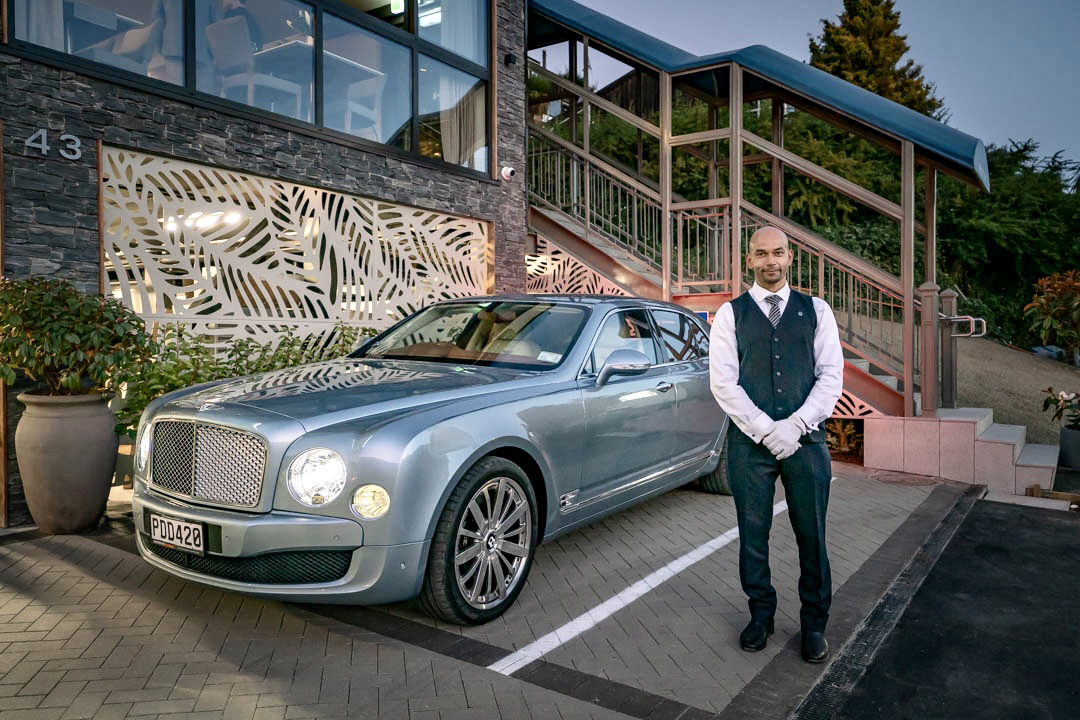 Private jets have their own Auckland Airport terminal and there's a Bentley awaiting Queenstown transfers to The Carlin. Photo / Supplied
