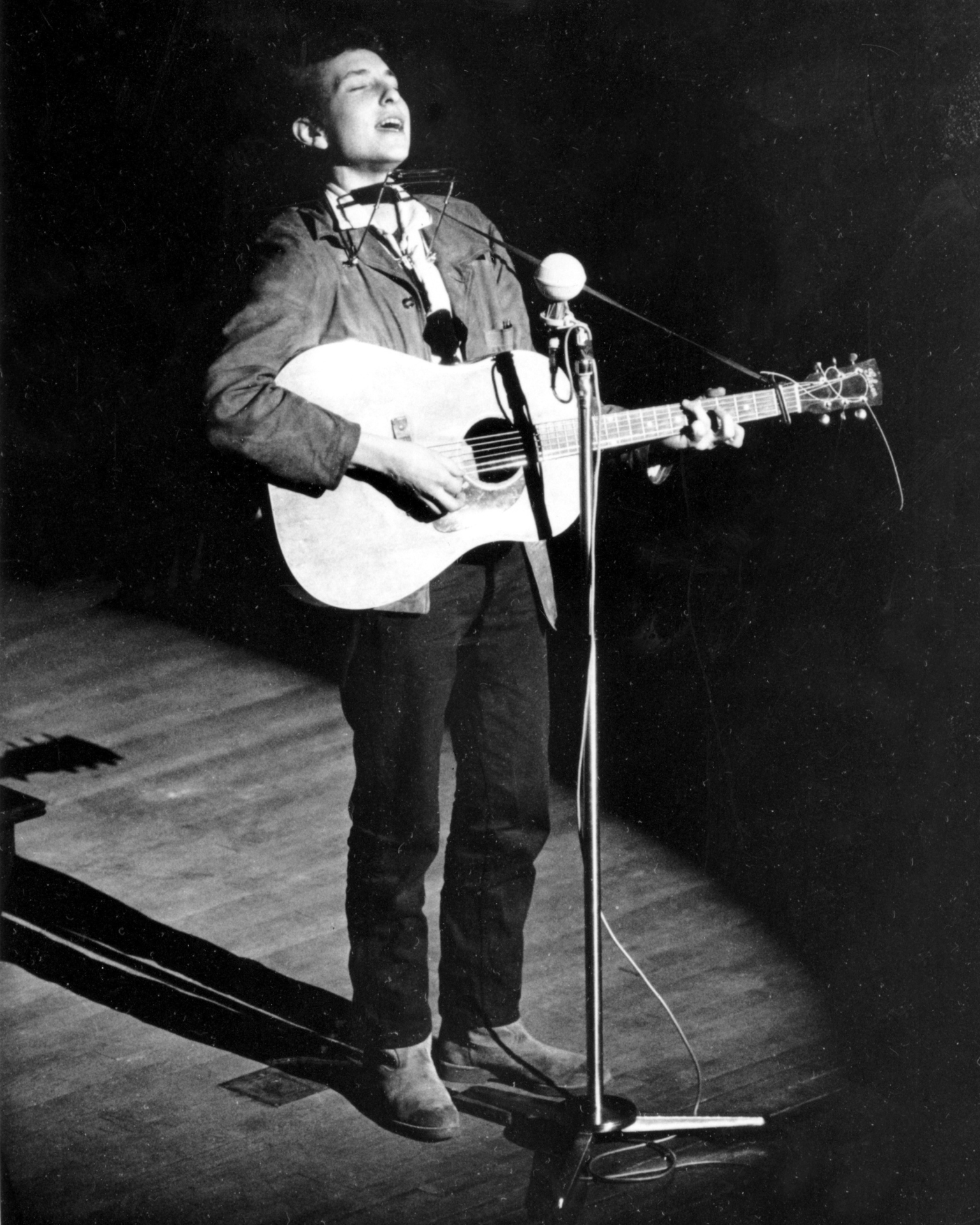 Folk singer and songwriter Bob Dylan, 22, performing in 1963. Photo / AP, File