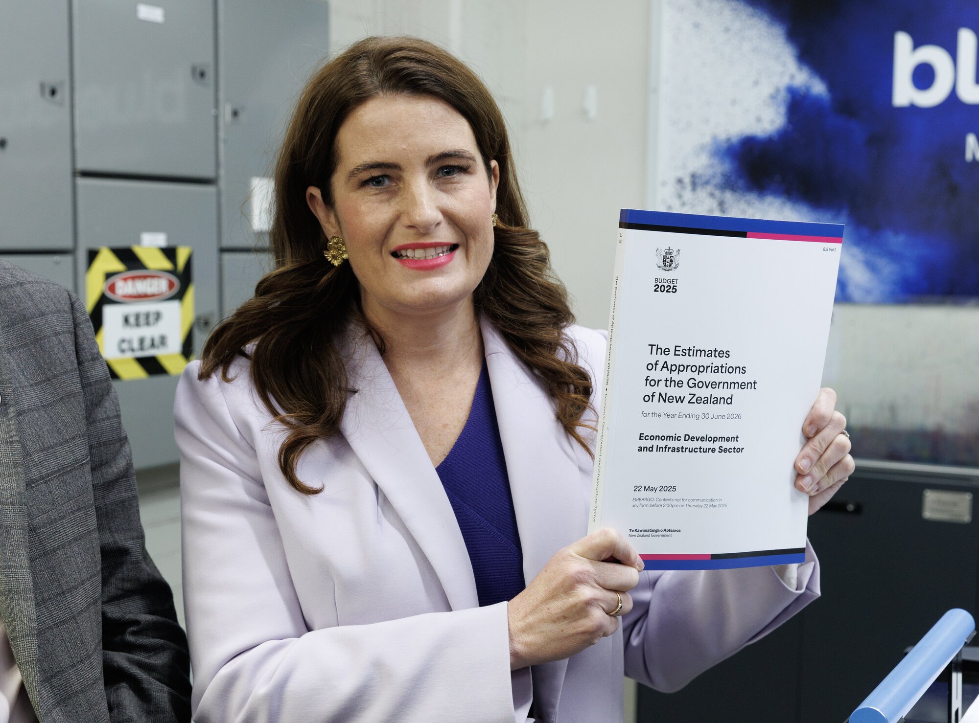 Finance Minister Nicola Willis with a copy of the Budget 2025. Photo / Mark Mitchell