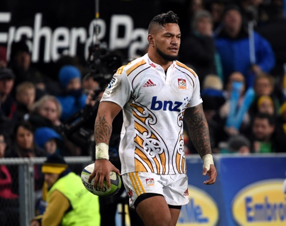 Hika Elliot leads the Chiefs out for his 100th Super Rugby game on Saturday. He was presented a mounted pounamu mere, the NZ Rugby gift for centurions, after the game