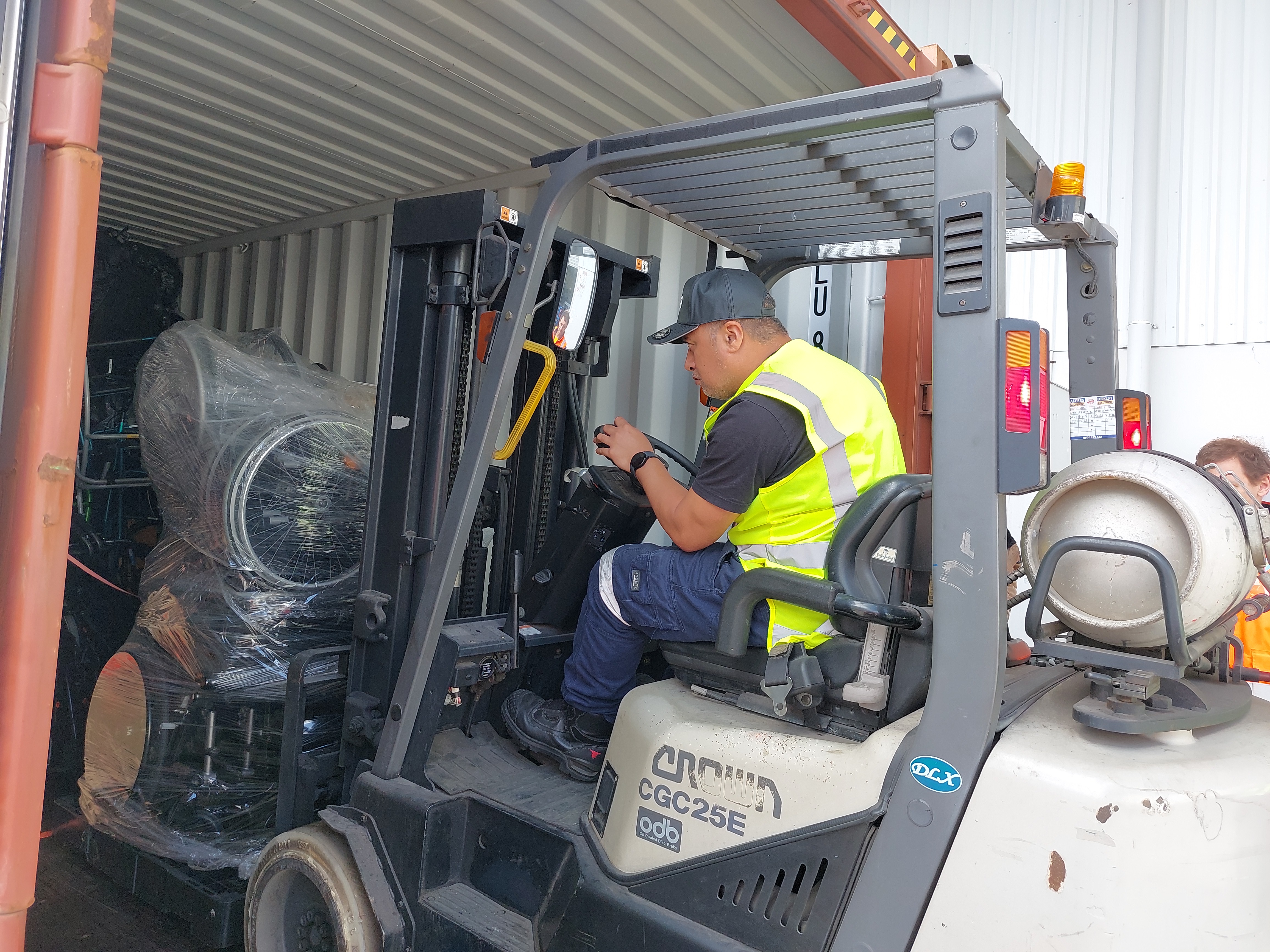 The wheelchairs were wrapped and loaded into a container bound for Ukrainian war hospitals.
