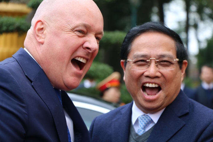 Prime Minister Chris Luxon in Vietnam, sharing a laugh with Vietnamese Prime Minister Pham Minh Chinh. Photo / Pool, Giles Dexter