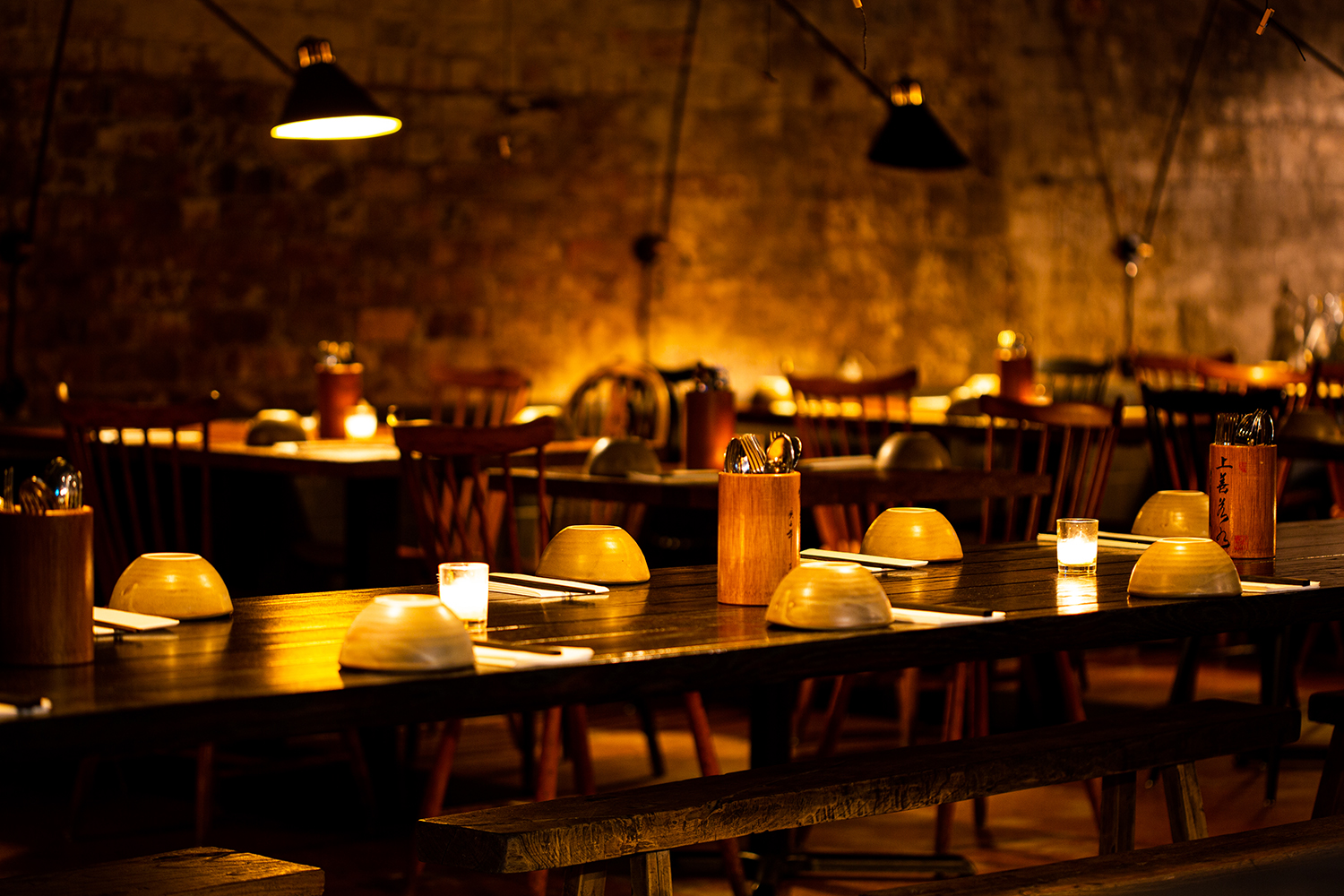 Ghost Street is cast in warm light from candles and Anglepoise lamps. Photo / Babiche Martens