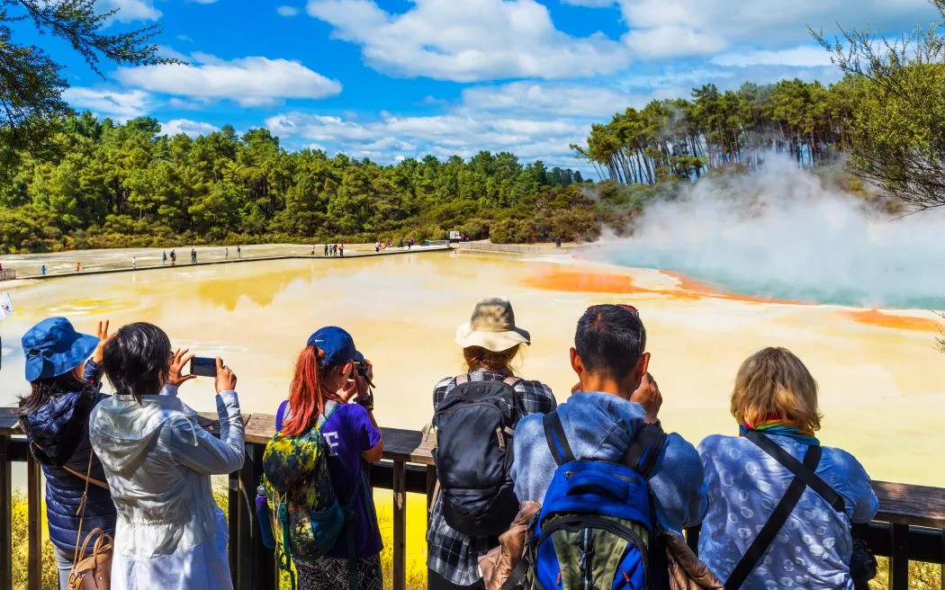 Tourists visiting the geothermal pools at Rotorua attraction Wai-O-Tapu. Photo /  123RF