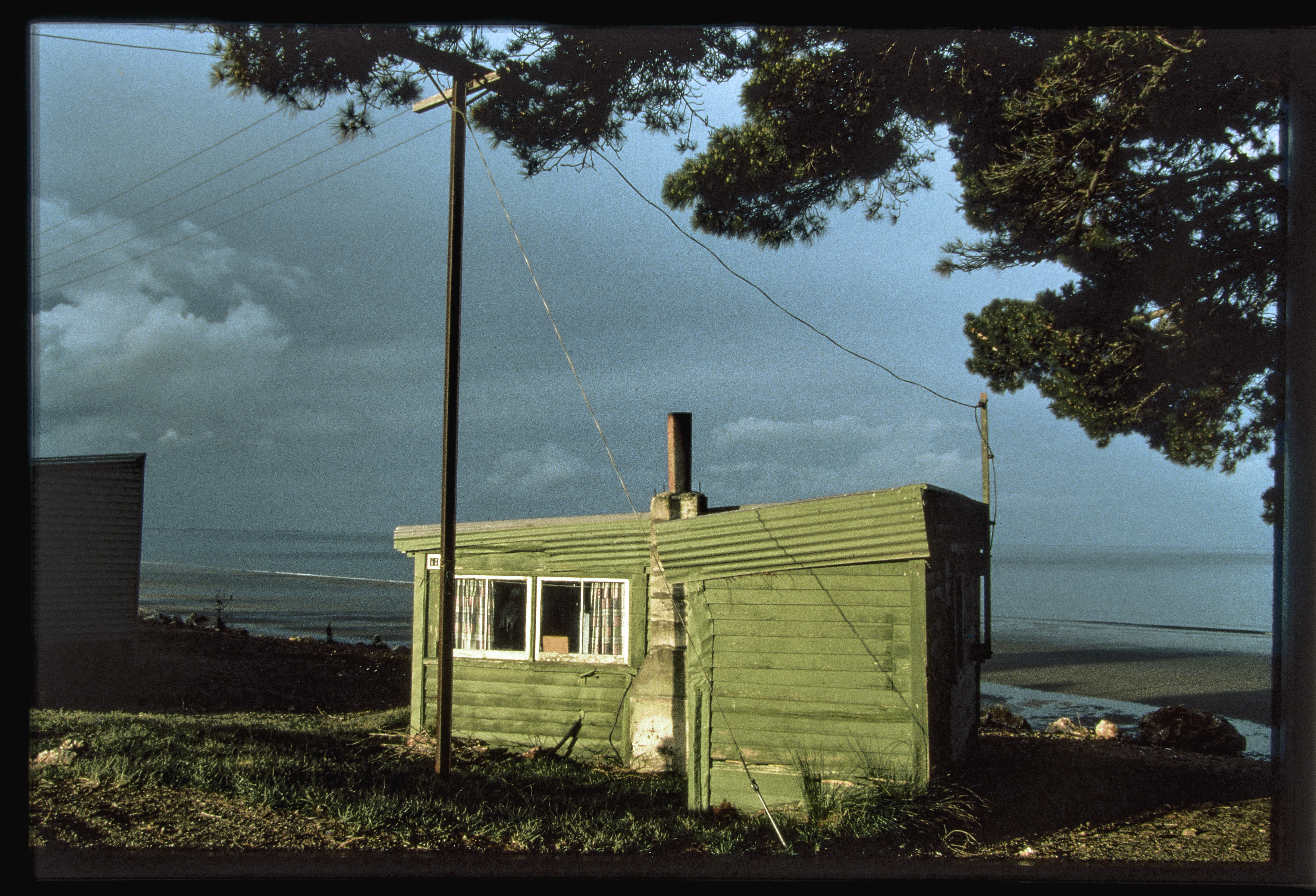 Cabin at Pakawau camping ground. Photo / Robin Morrison