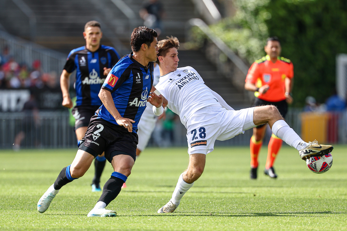 Melbourne Victory's Kasey Bos and Auckland FC's Hiroki Sakai. Photo / Photosport